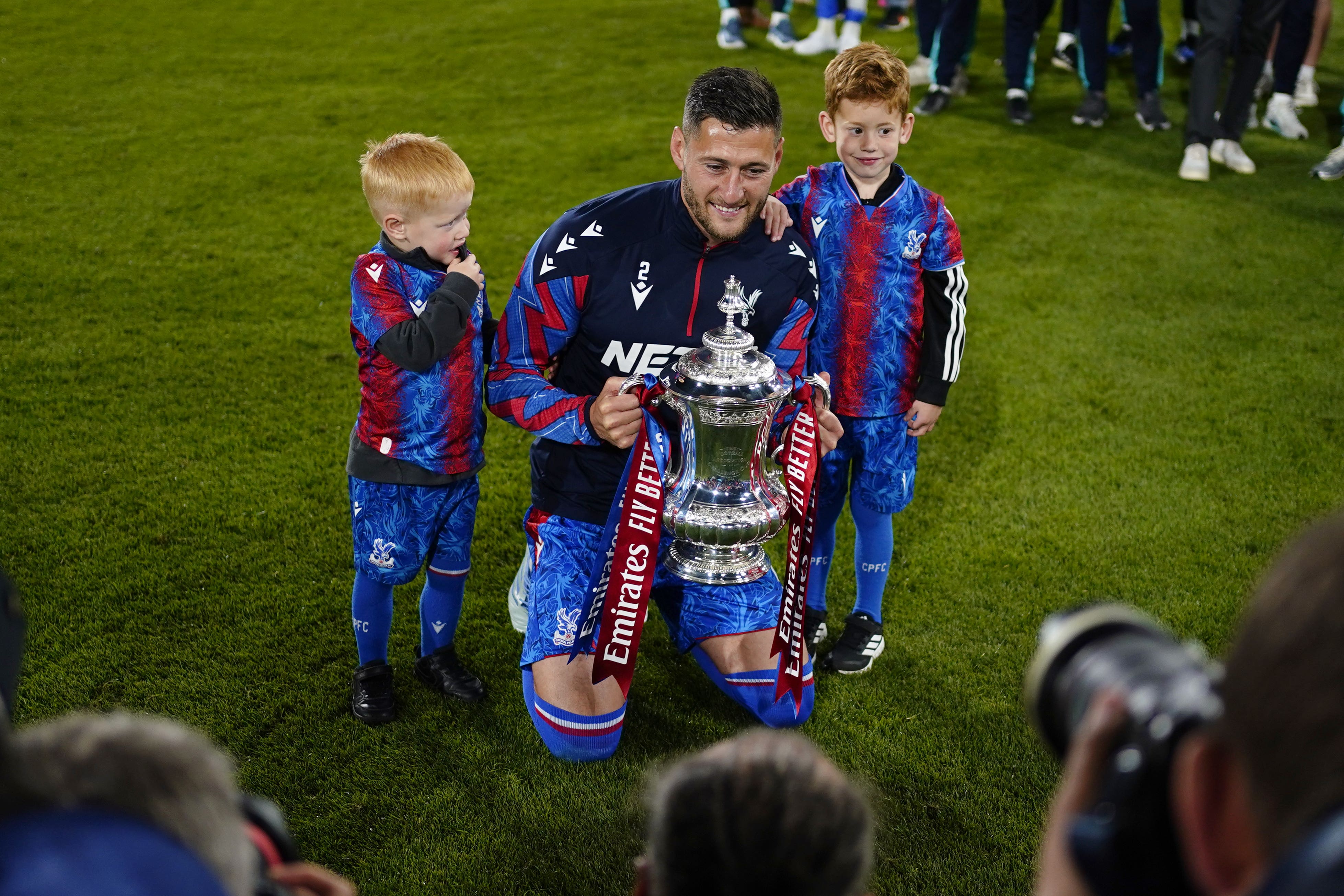 Joel Ward and his children with the FA Cup after his final home game for Crystal Palace (Jordan Pettitt/PA)