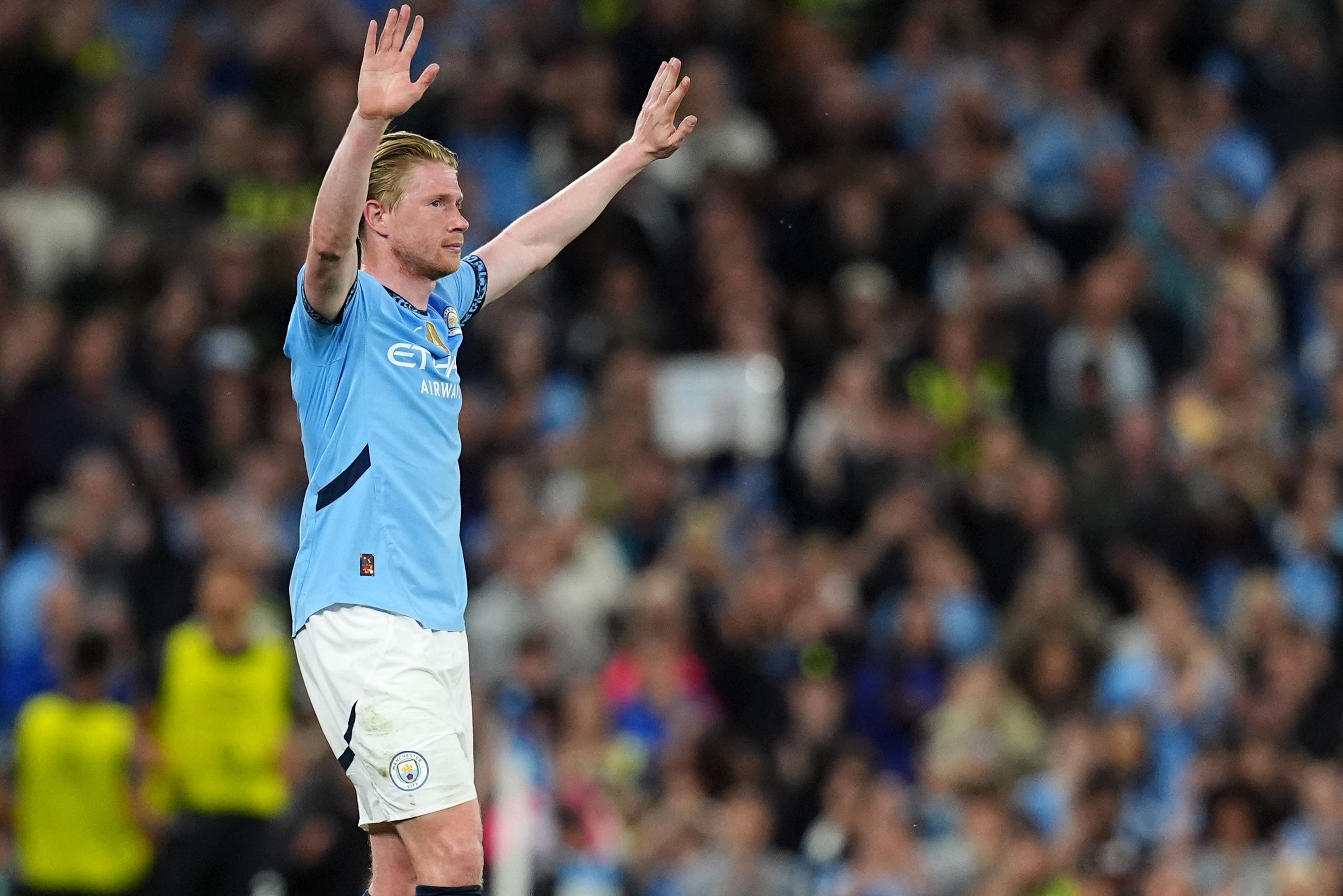Manchester City midfielder Kevin De Bruyne waves to the crowd as he is substituted against Bournemouth (Martin Rickett/PA)