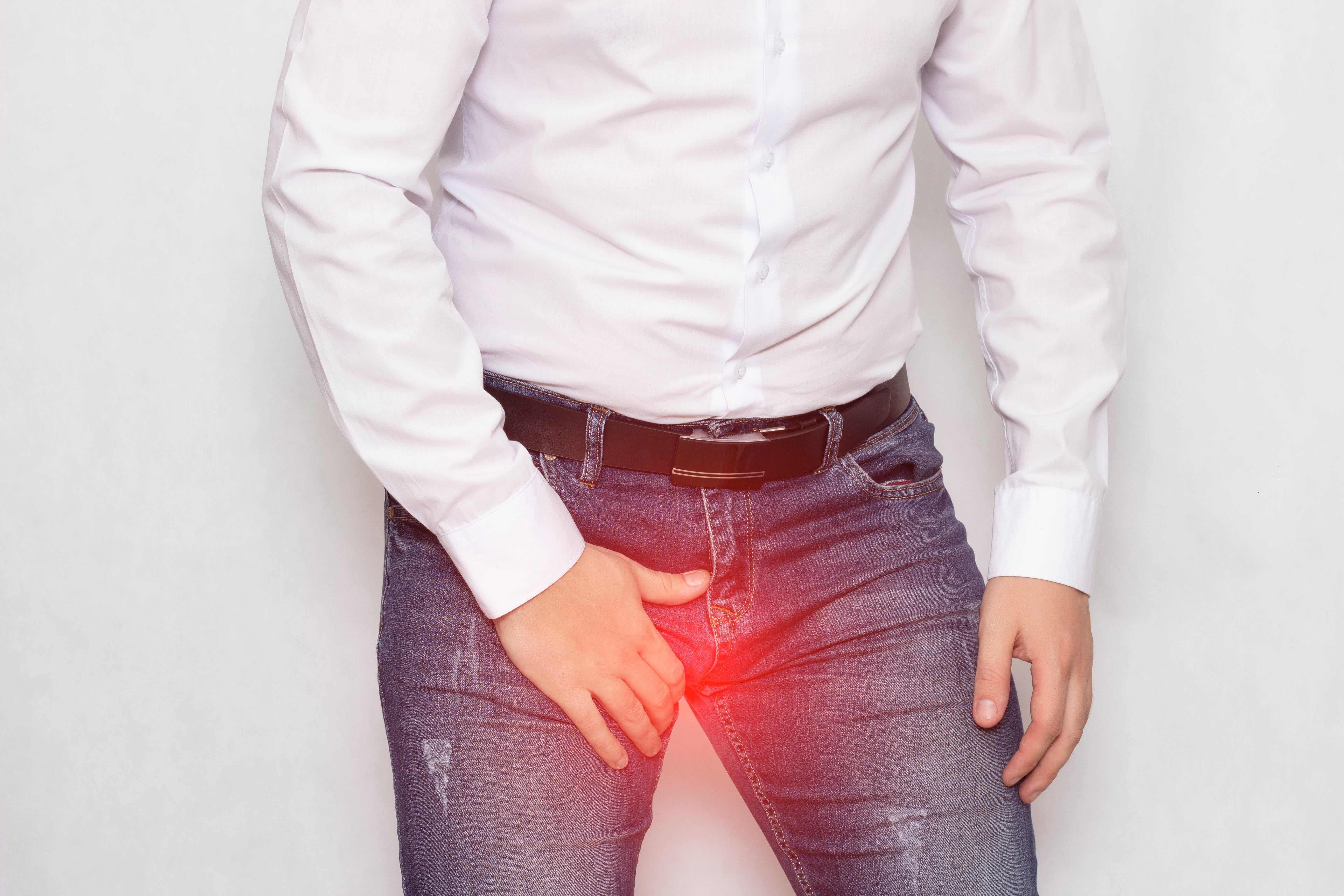 Symptoms can include pain in the testicles
