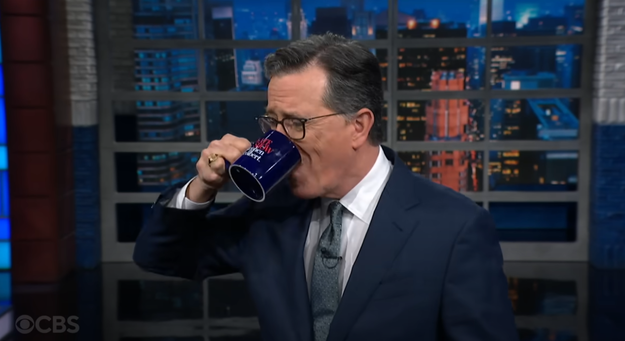 Late-night host Stephen Colbert comically spat out water after pointing out that Paramount is looking to pay $50 million to settle Donald Trump's lawsuit over a 60 Minutes interview with Kamala Harris