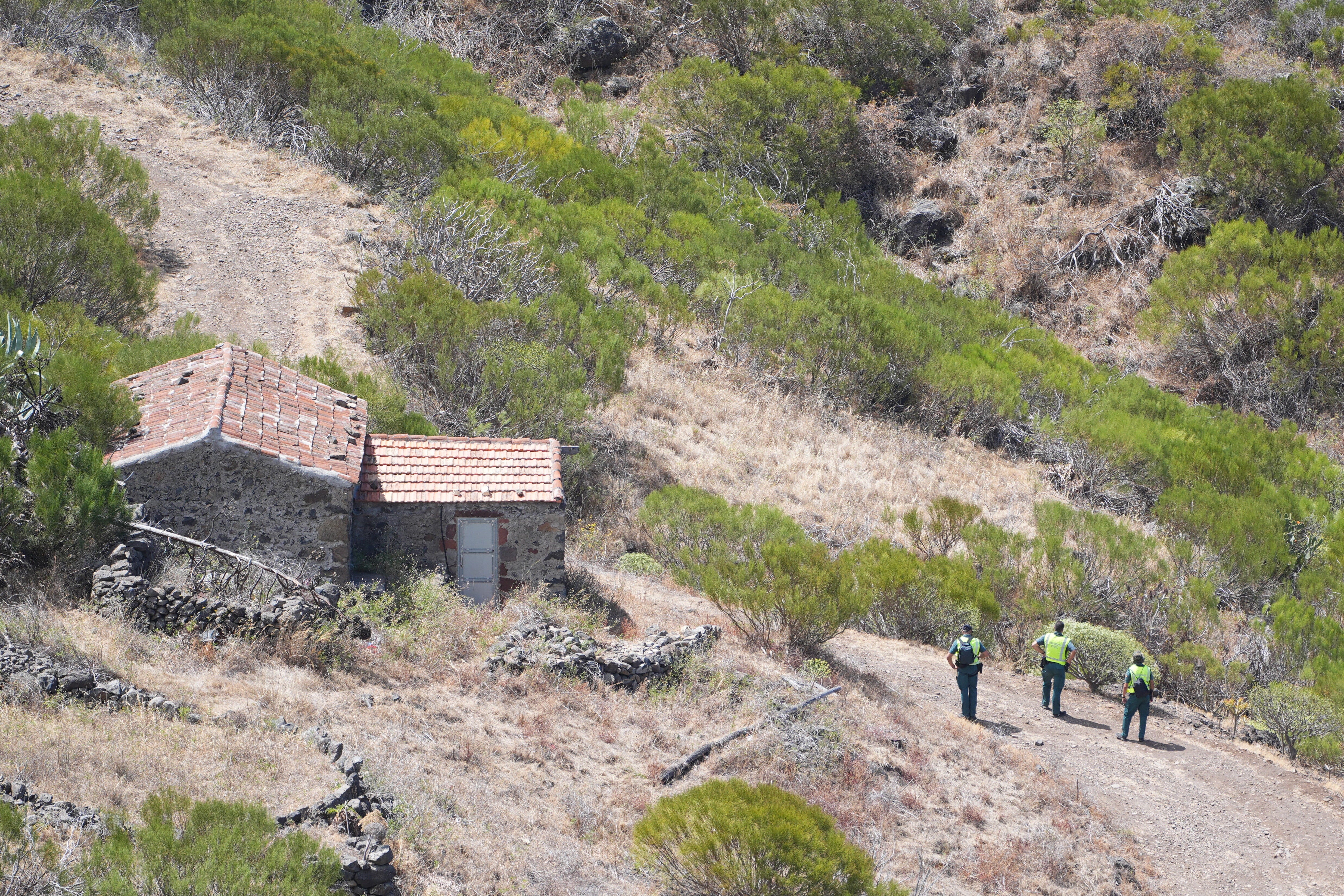 Members of a search and rescue team search near the last known location of Jay Slater, near to the village of Masca, Tenerife