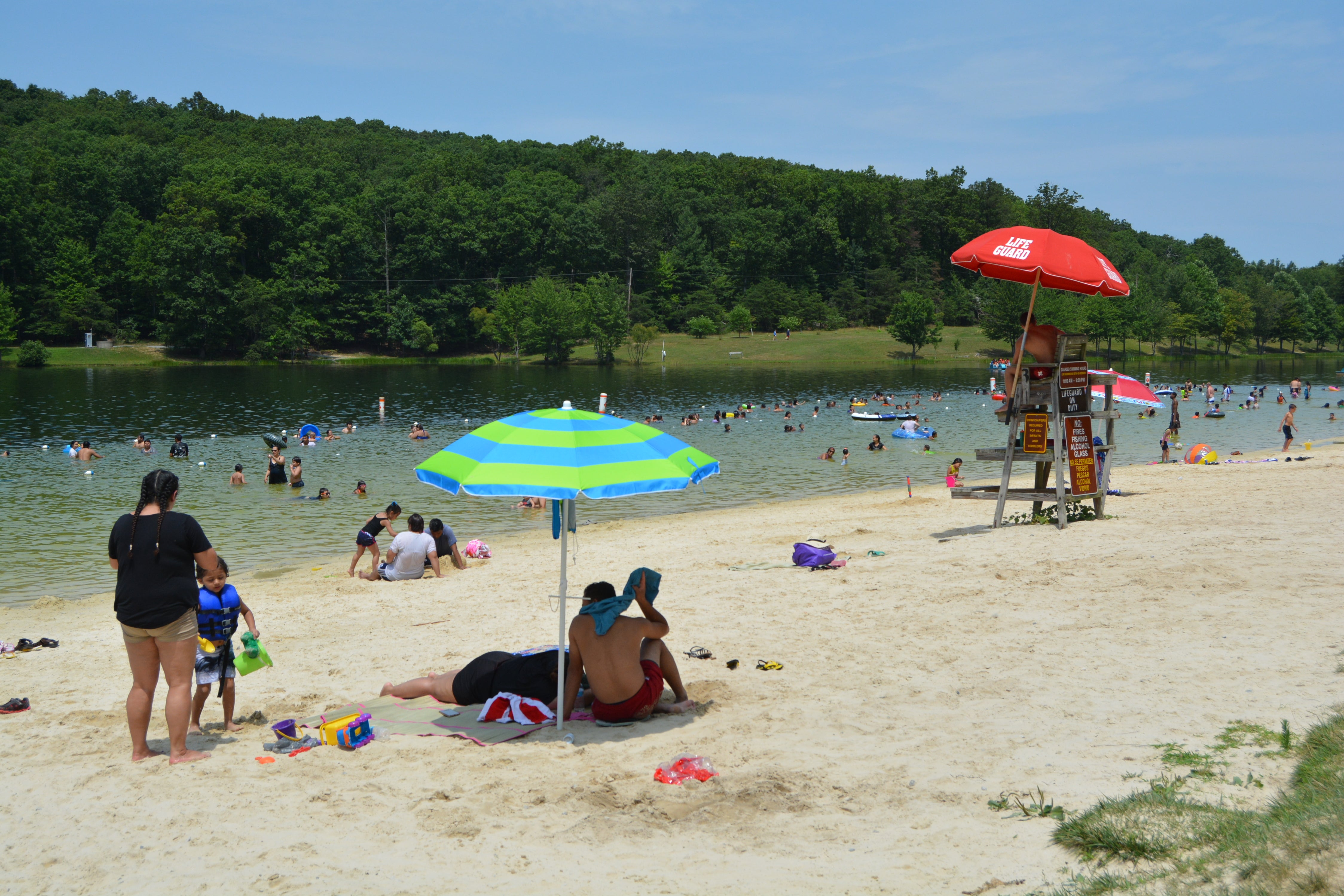 Queues have been known to form at midnight for a prime spot at Greenbrier State Park's beach (above)
