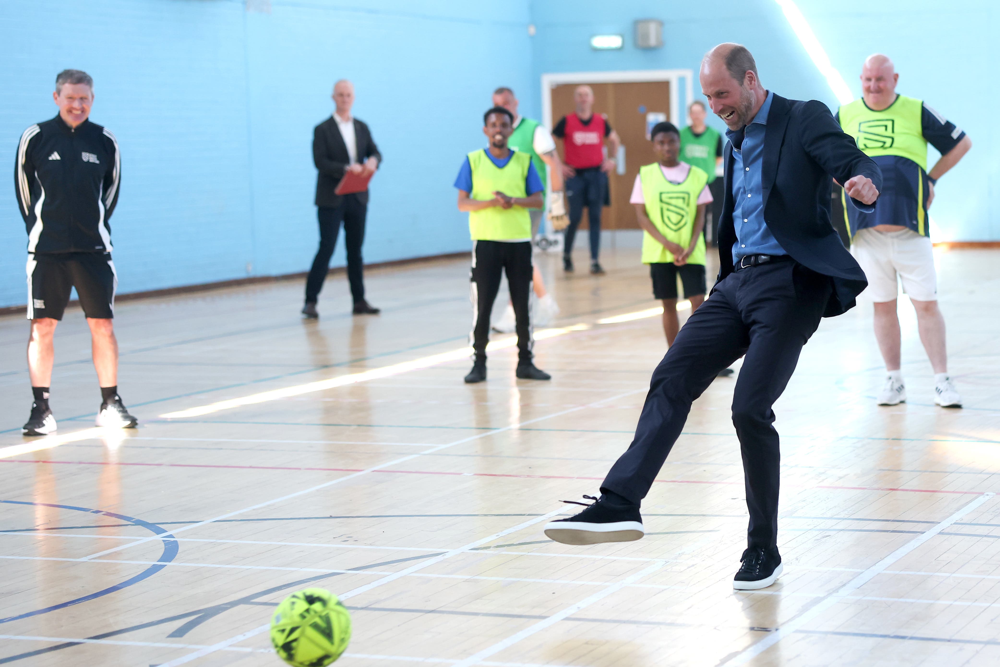 The Prince of Wales, known as the Duke of Rothesay when in Scotland, plays football during a visit to Leith Community Centre, Edinburgh, to shine a light on the power of community-led social impact. Picture date: Wednesday May 21, 2025.