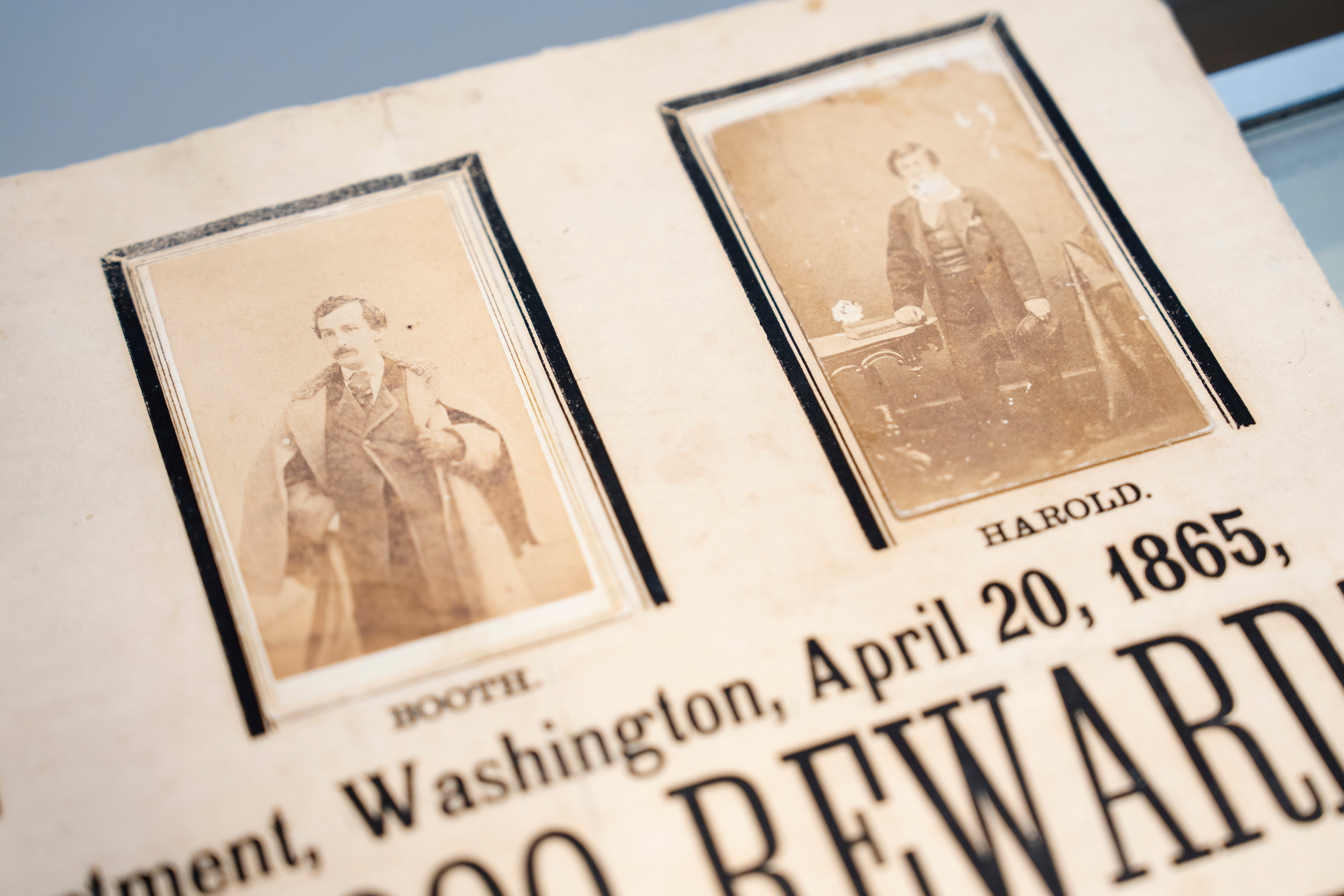 A poster that announces a $100,000 reward for the arrest of John Wilkes Booth, John Surratt and David Herold is part of the auction.