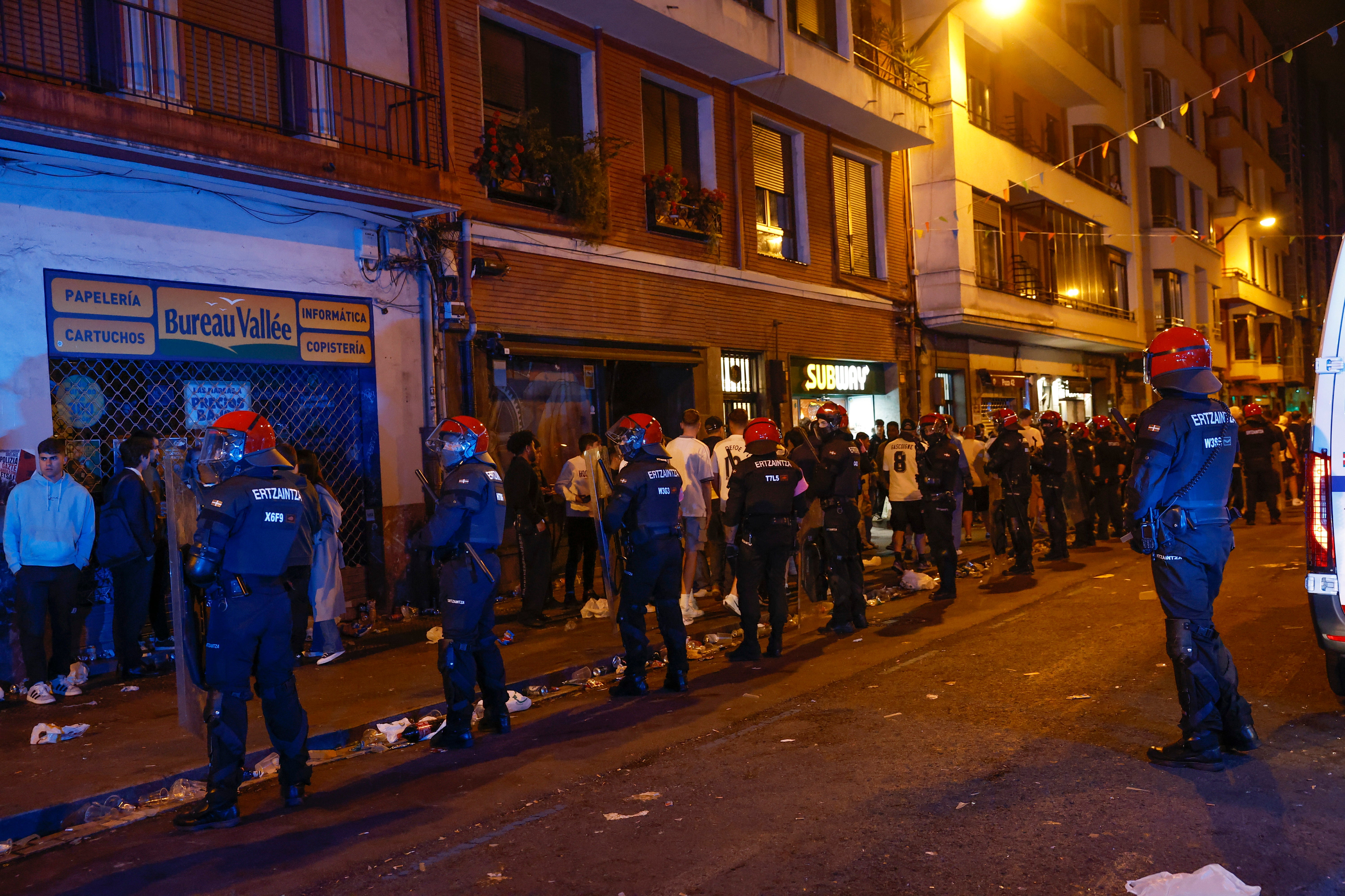 Basque Police line up as supporters leave the stadium after the UEFA Europa League final football match between Tottenham Hotspur and Manchester United, in Bilbao, Spain on 21 May