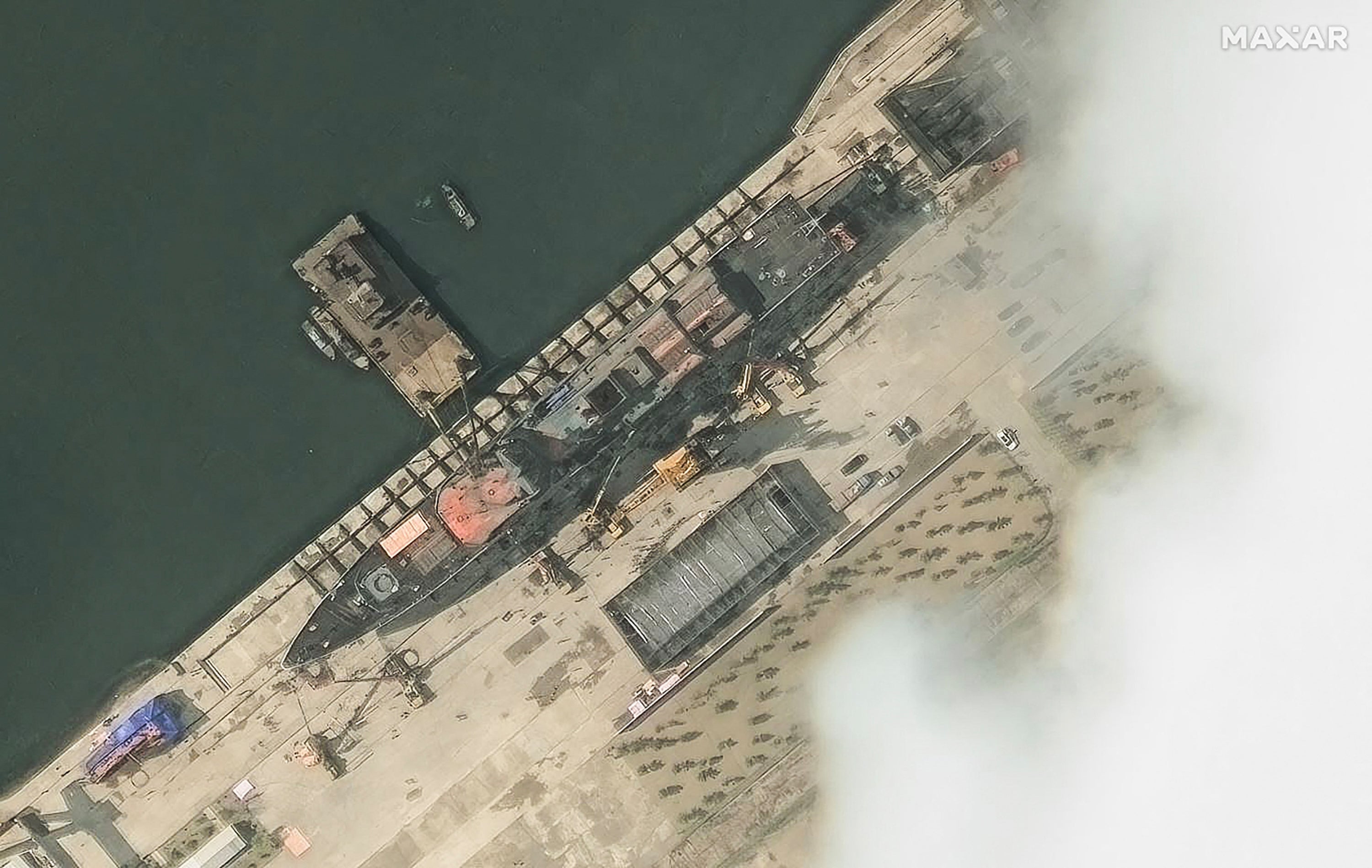 A new North Korean warship at the harbour ahead of its launch in Chongjin