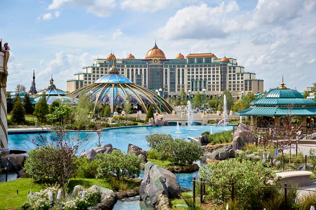 <p>Sitting within the park’s boundaries, the glittering Helios Grand Hotel is 14-storey colossus with its own park entry</p>