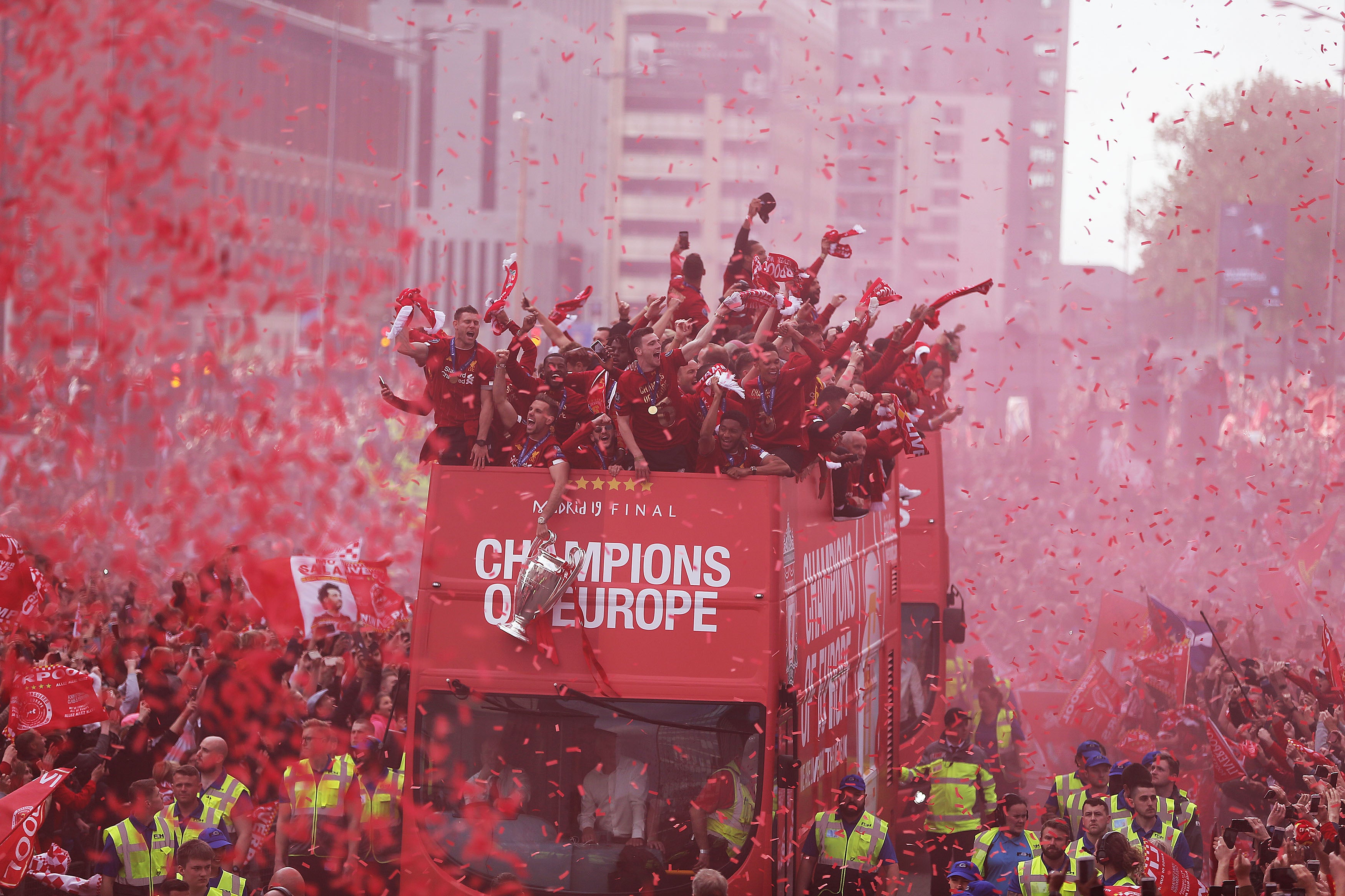 Liverpool's players on board a parade bus after winning the UEFA Champions League, June 2019, Liverpool