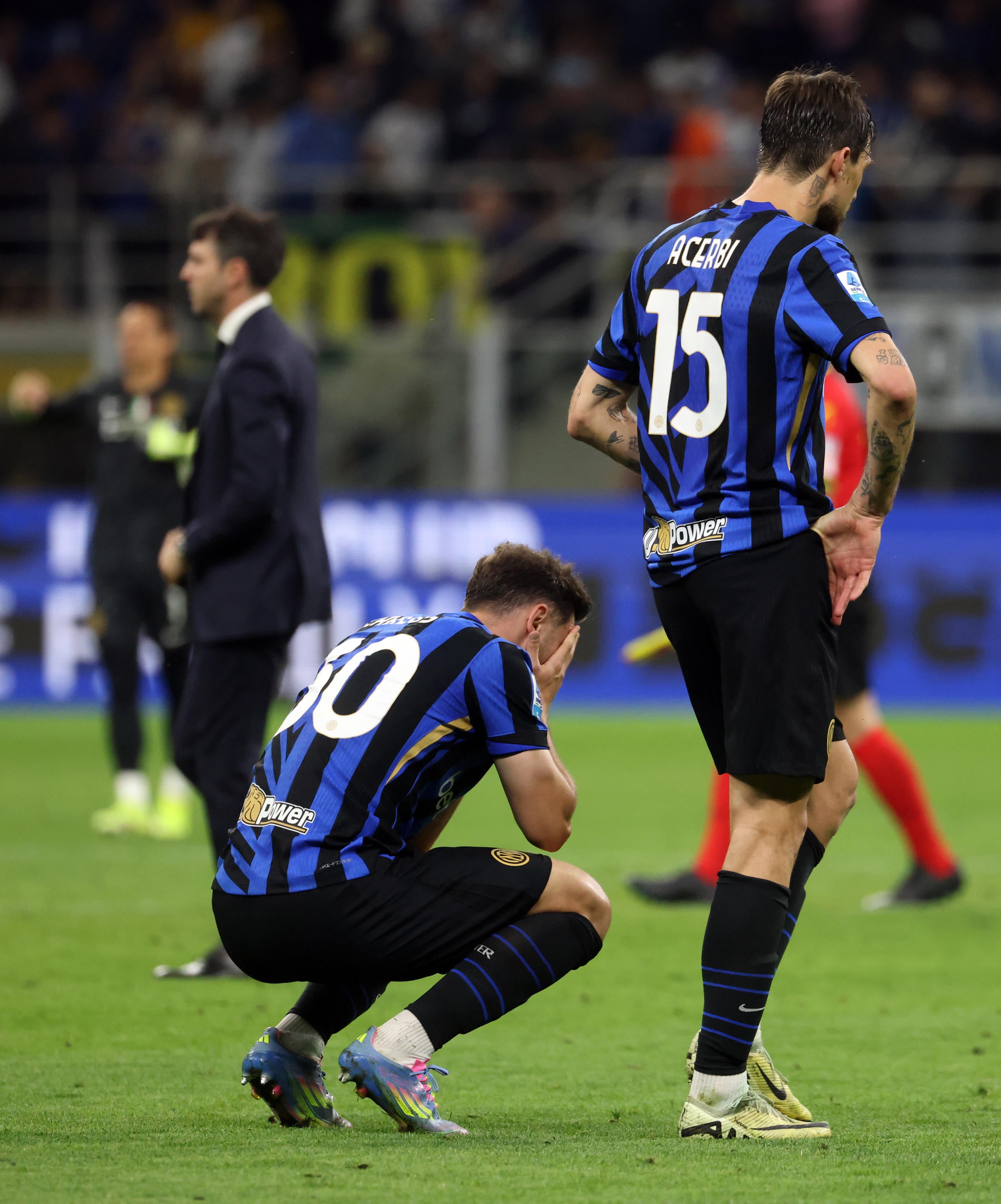 Inter's Carlos Augusto (left) and Francesco Acerbi look dejected after dropping points against Lazio