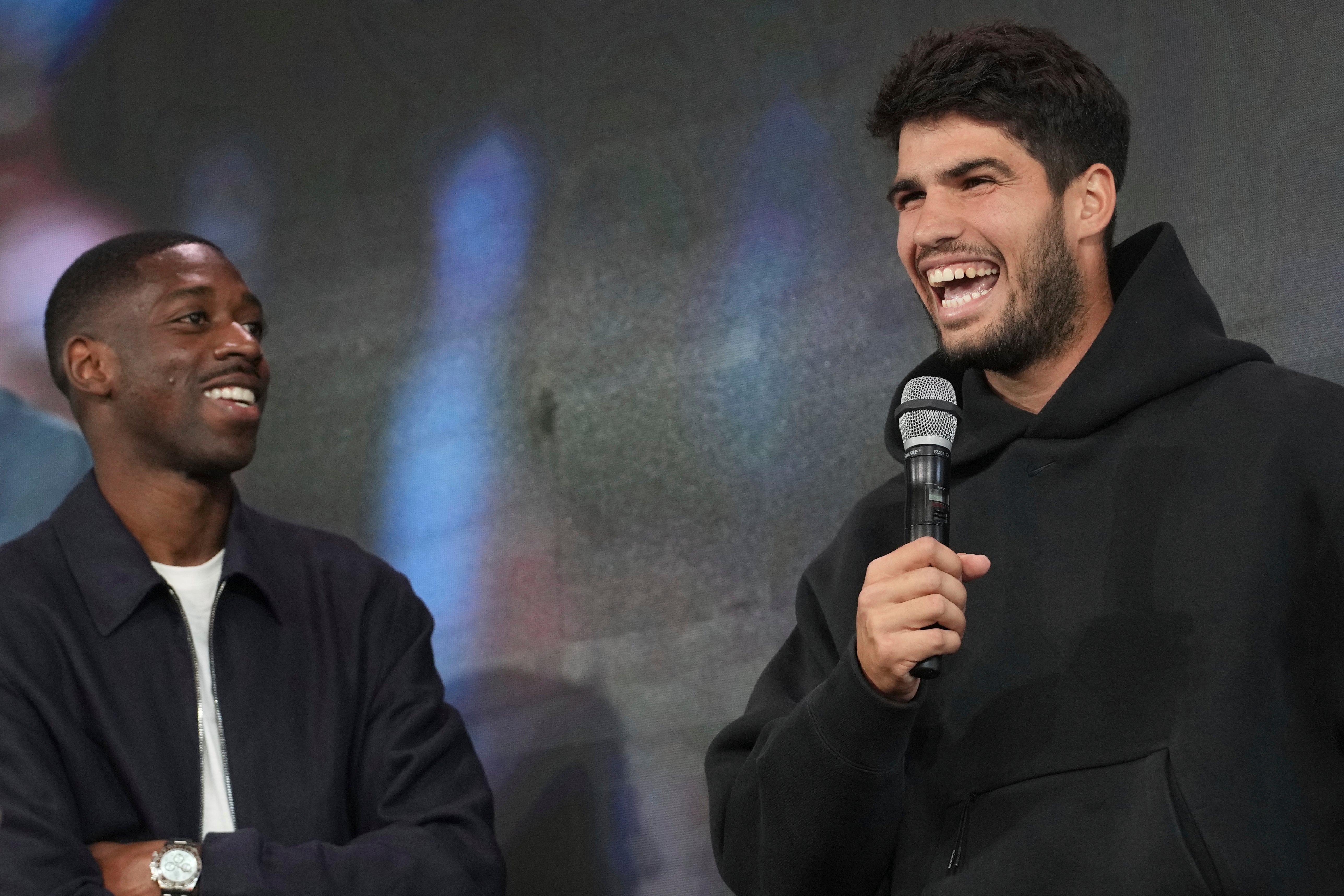 Carlos Alcaraz, right, and Ousmane Dembele at the draw (Christophe Ena/AP)