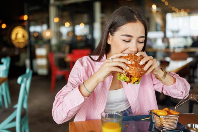 <p>Table for one: 13 per cent more people are eating alone in restaurants this year compared to the last</p>