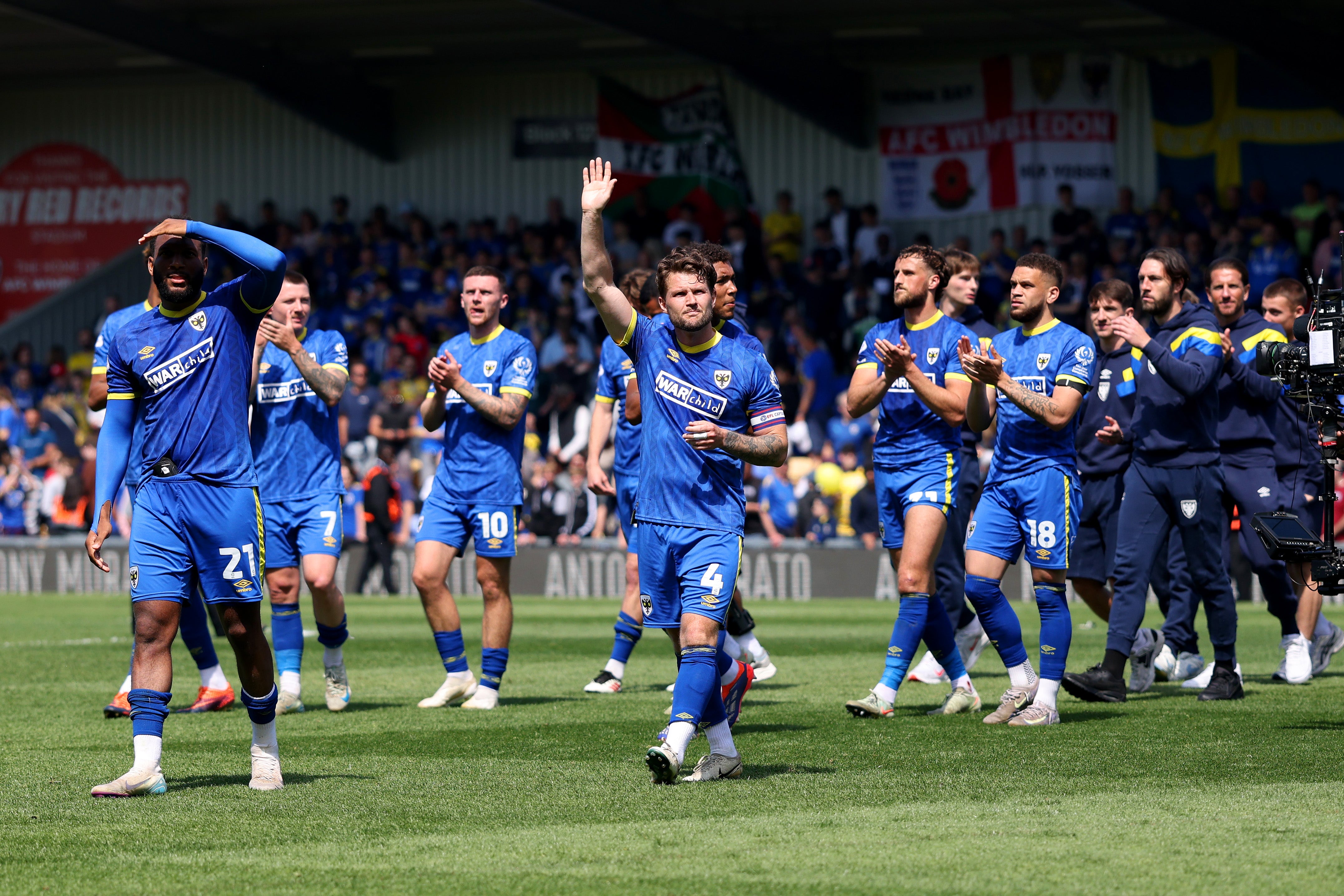 Will Wimbledon secure a spot in League One or will they be beaten in the play-off final by Walsall?