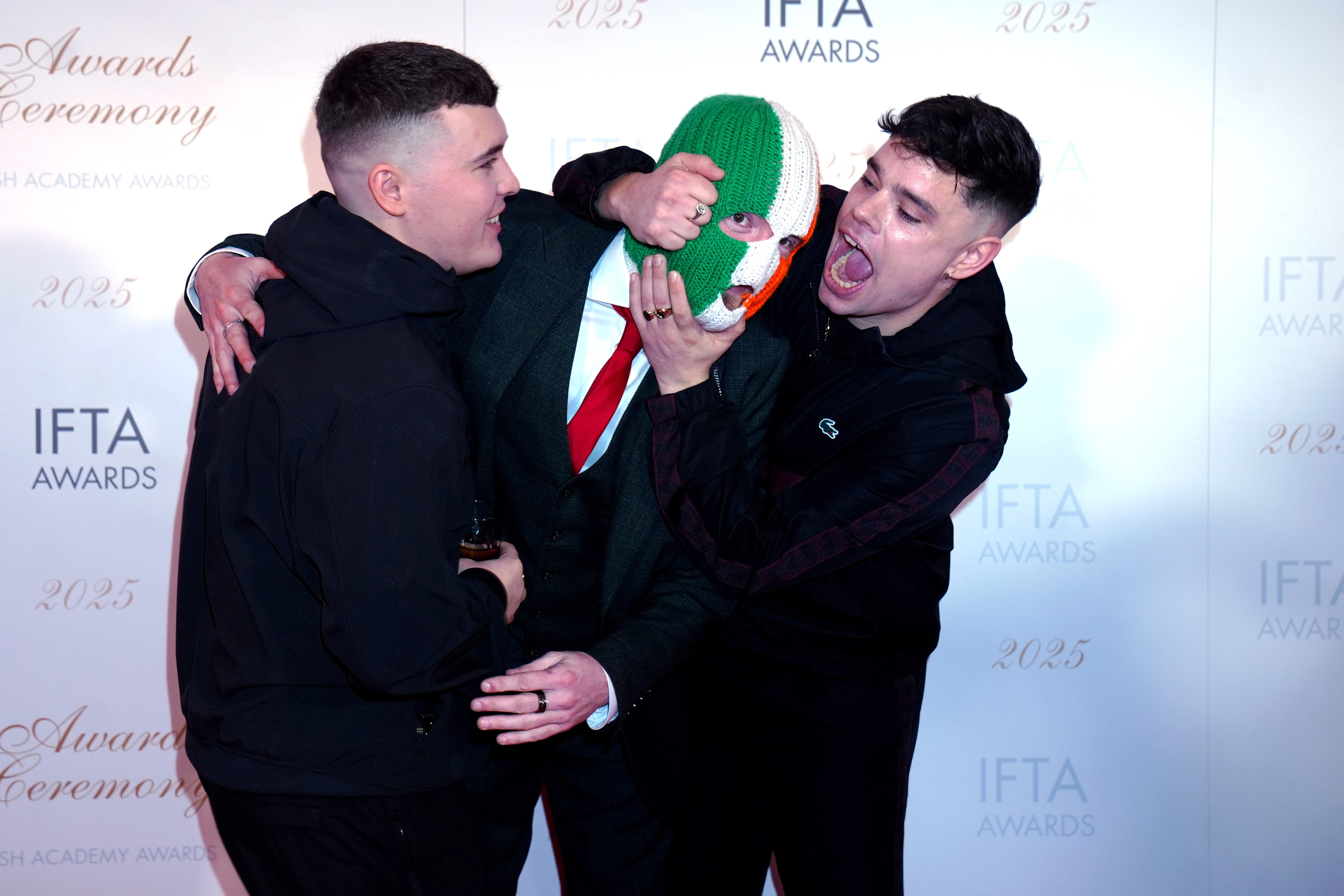 Members of Kneecap, Liam Og O Hannaidh (Mo Chara), JJ O Dochartaigh (DJ Provai), and Naoise O Caireallain (Moglai Bap) (Brian Lawless/PA)