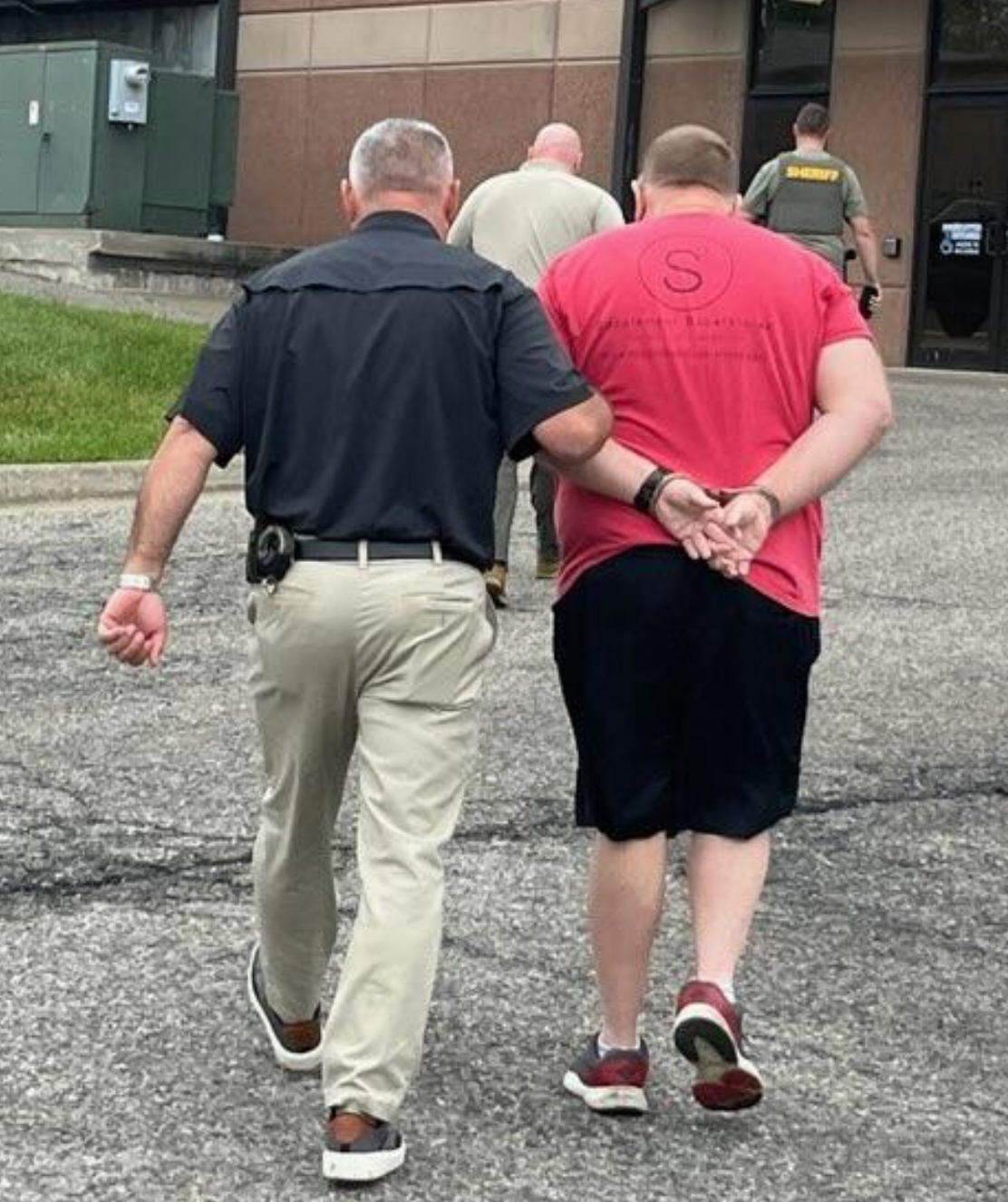 Jon Worrell is taken into custody