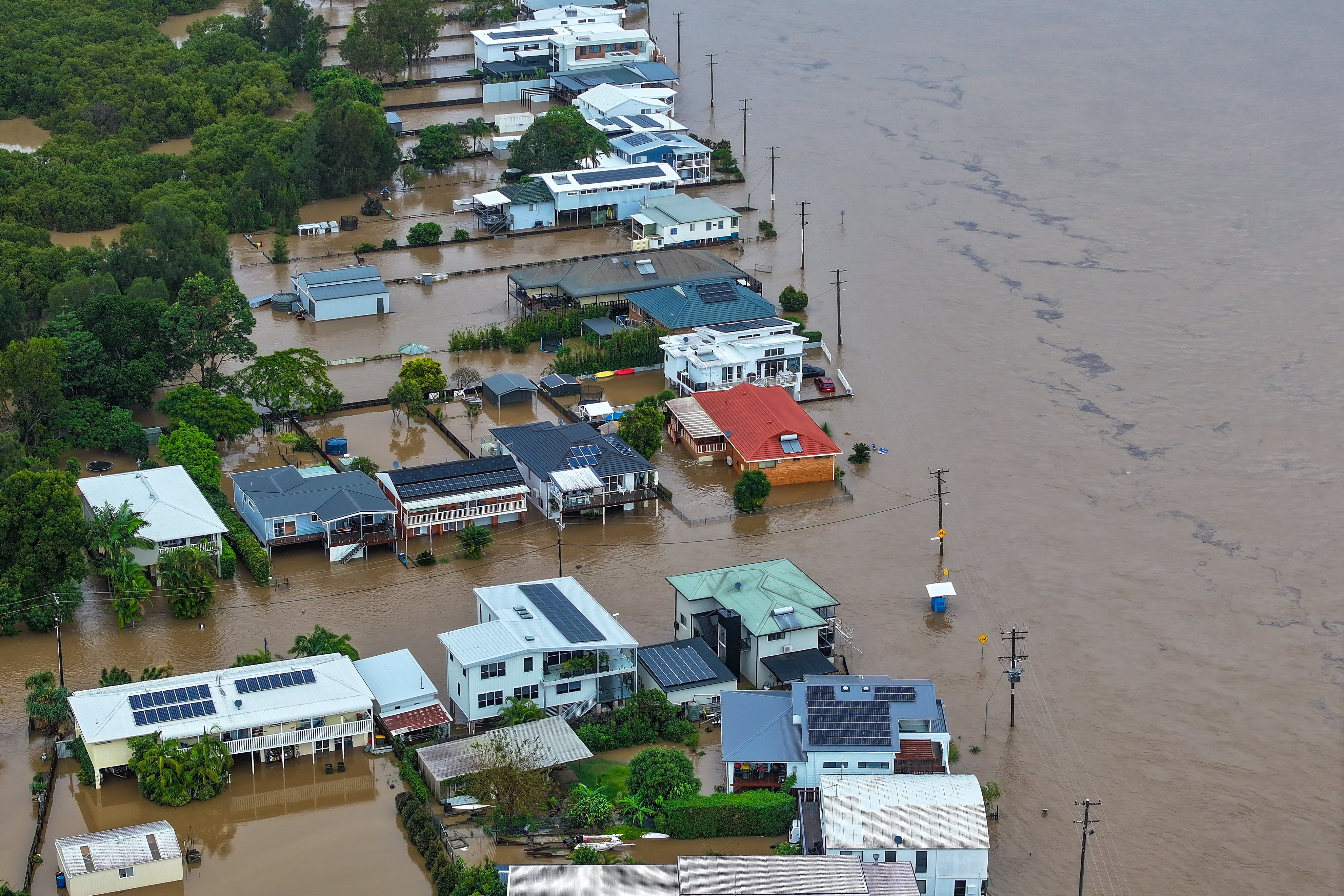 An aerial photo shows flooding at Settlement Point Road in Port Macquarie, New South Wales, Australia