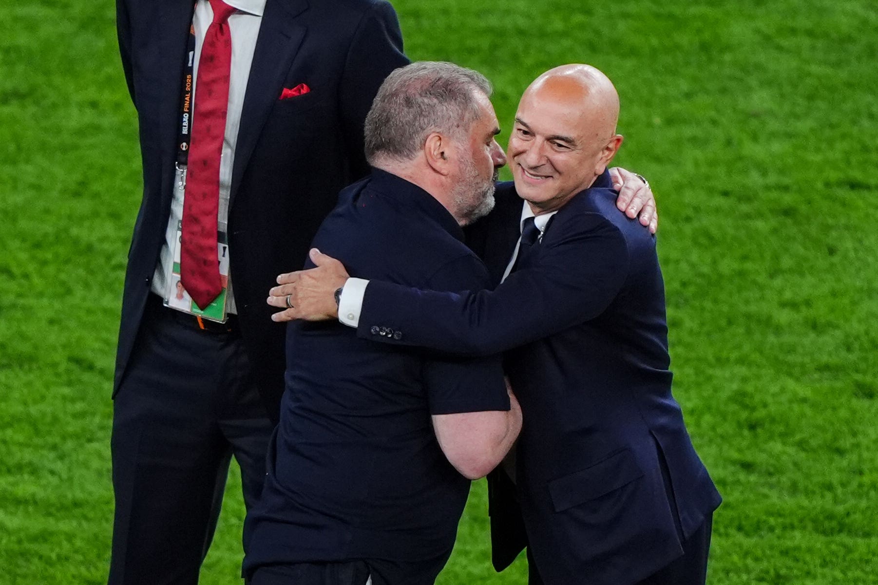 Postecoglou hugs Tottenham chairman Daniel Levy
