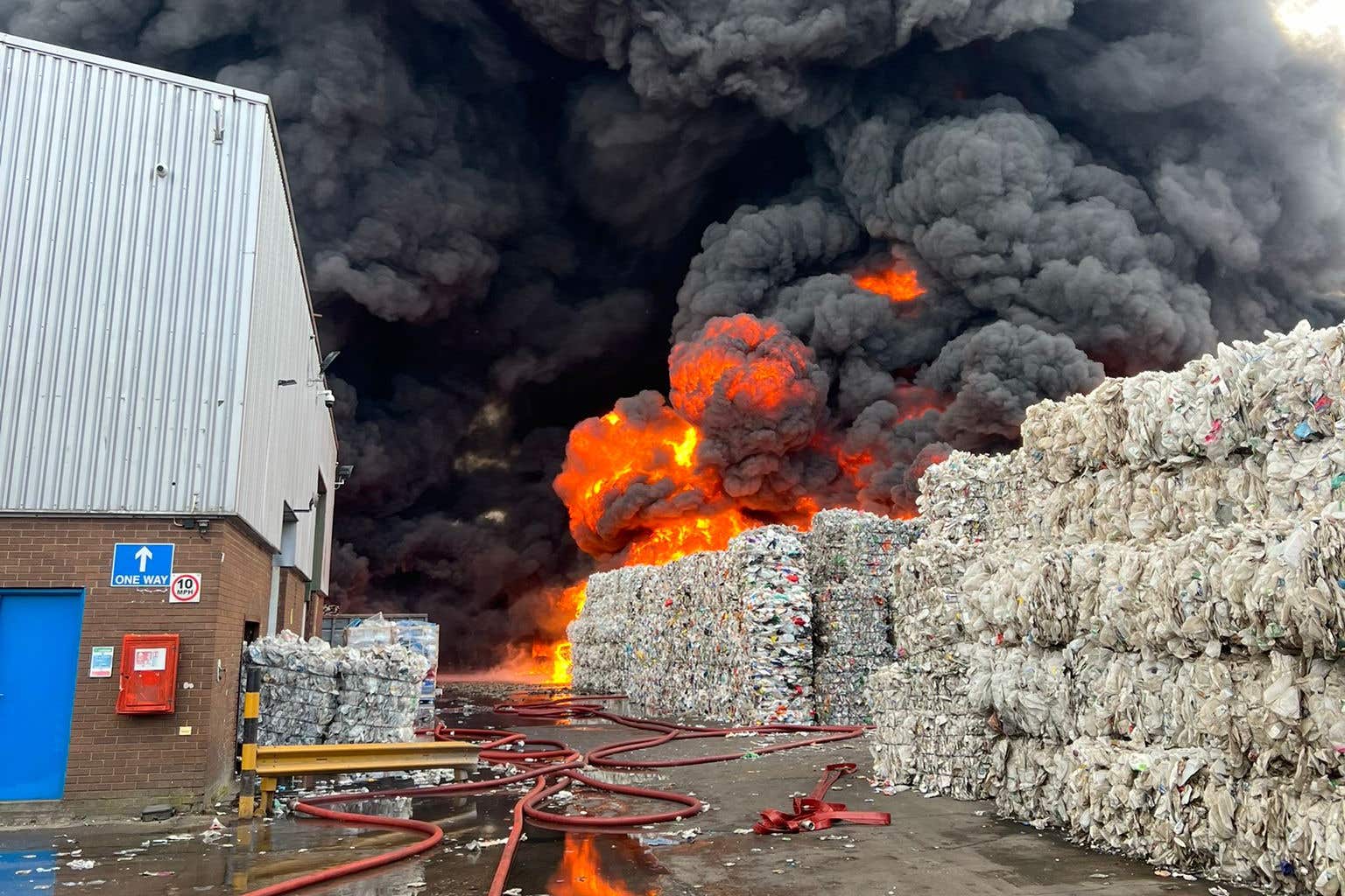 Twelve fire engines were attending the scene at the Northamptonshire industrial estate (Northamptonshire Fire and Rescue Service/PA)