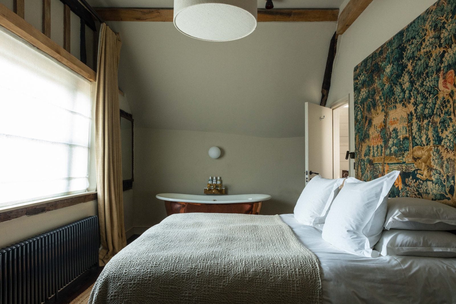 The George in Rye has individually designed rooms, some with rolltop baths
