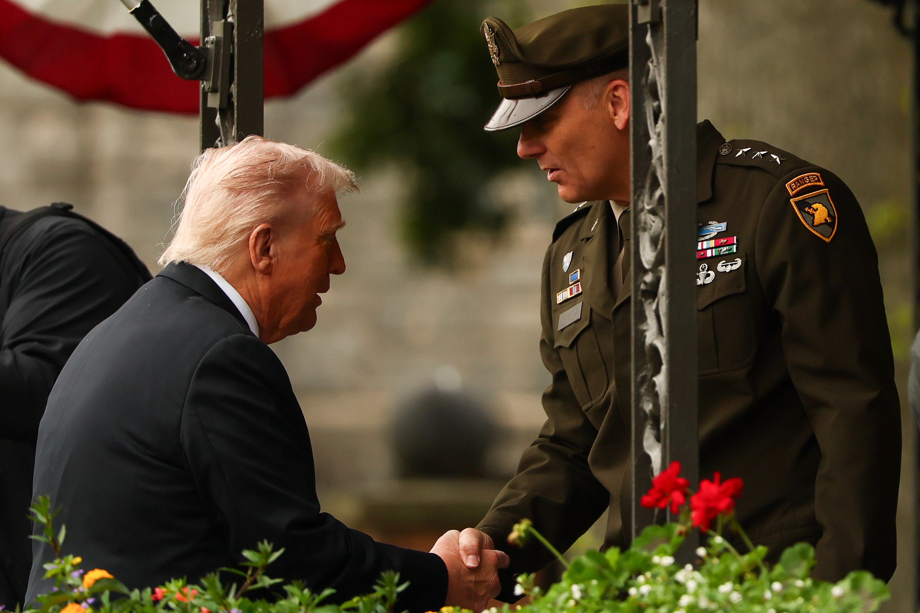 Trump shakes hands with West Point superintendent Steven W. Gilland