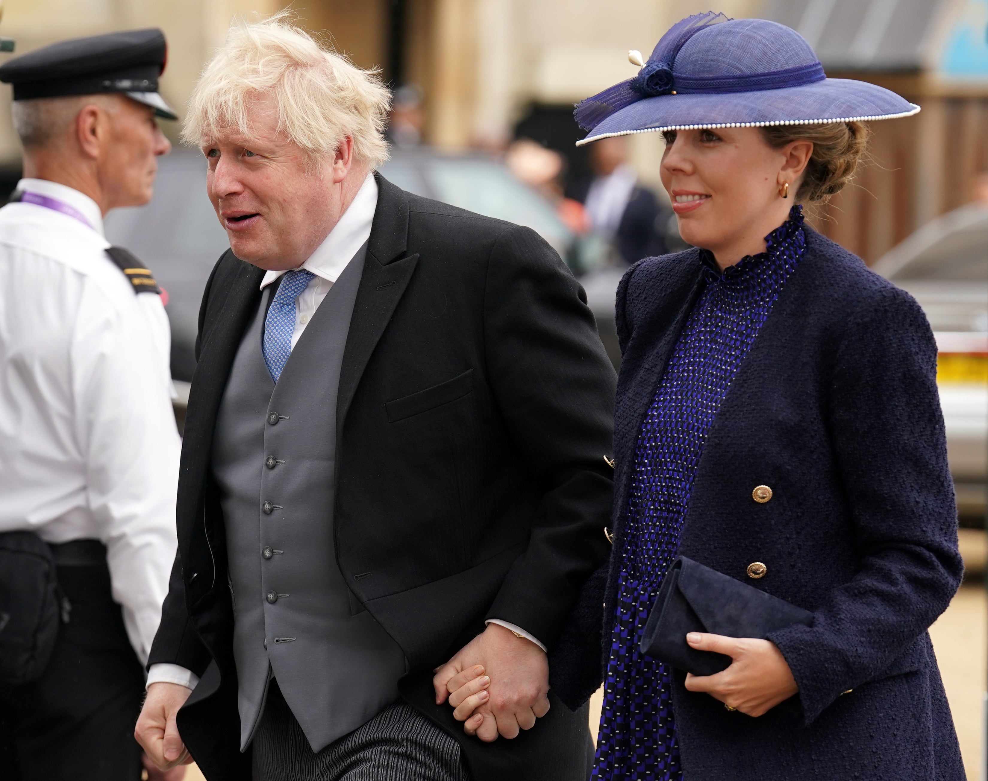 Former prime minister Boris Johnson and his wife Carrie Johnson arriving at Westminster Abbey (Andrew Milligan/PA)