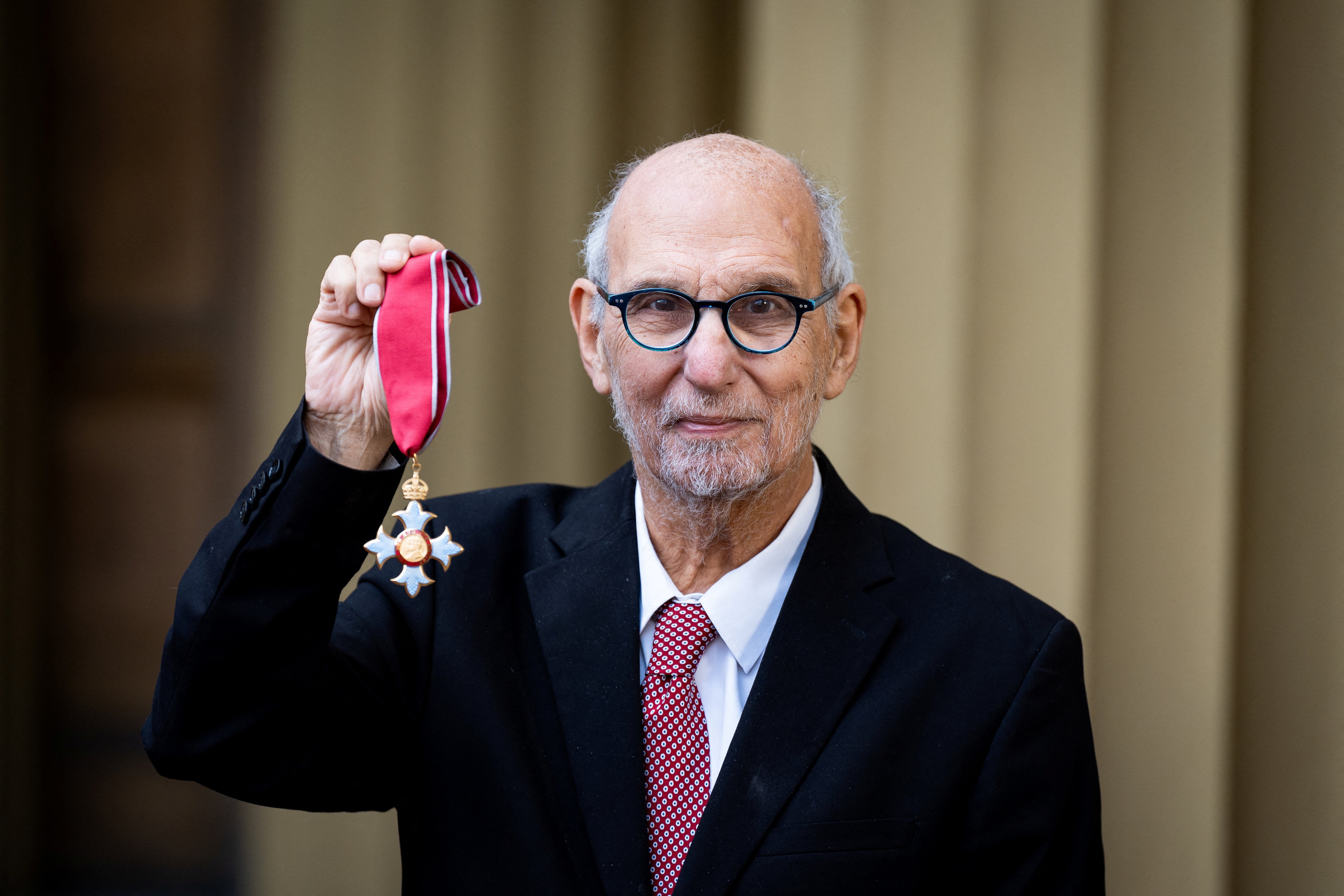 Yentob with his CBE in 2024