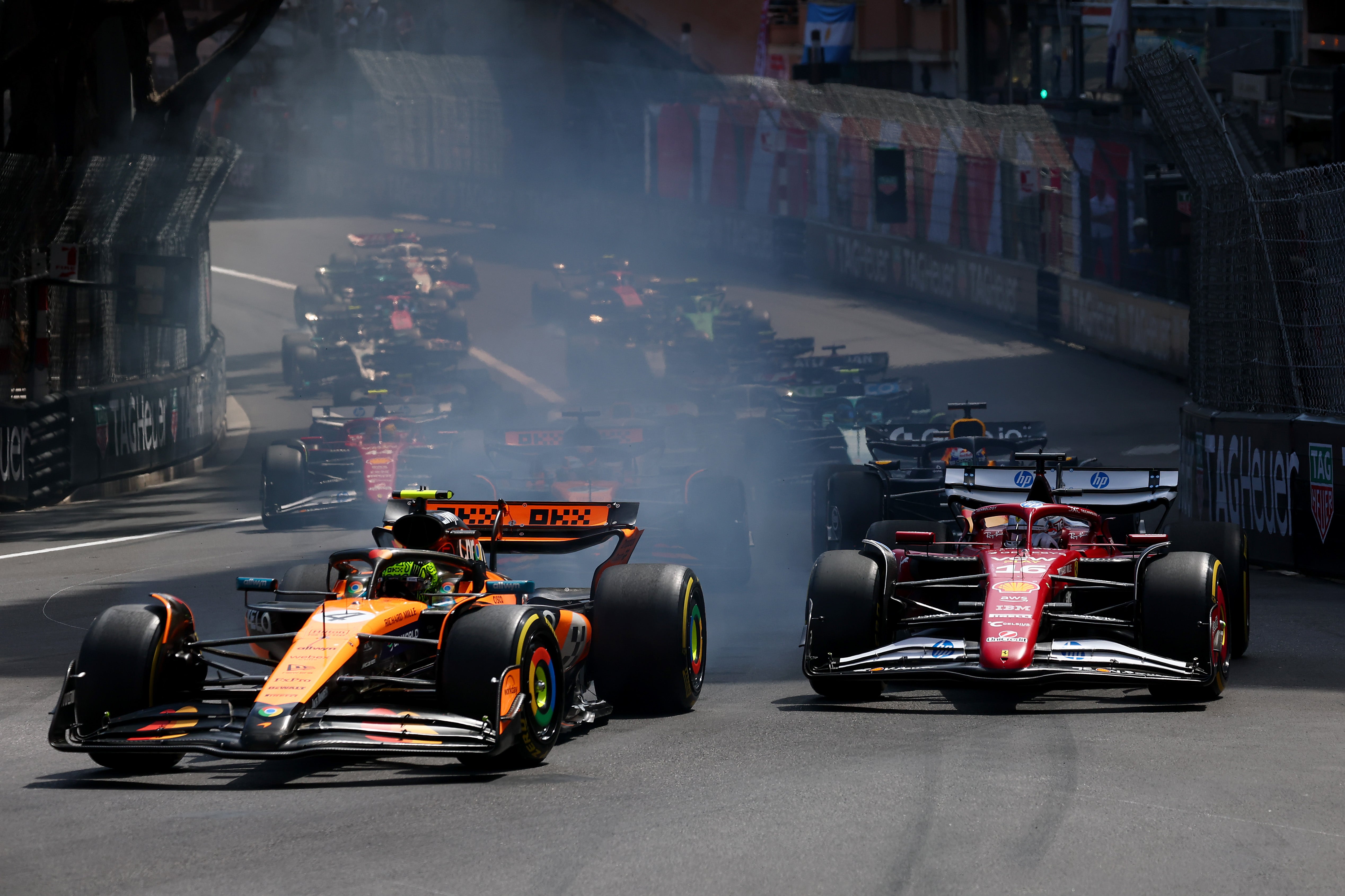 Norris held the lead at the start from Ferrari’s Charles Leclerc