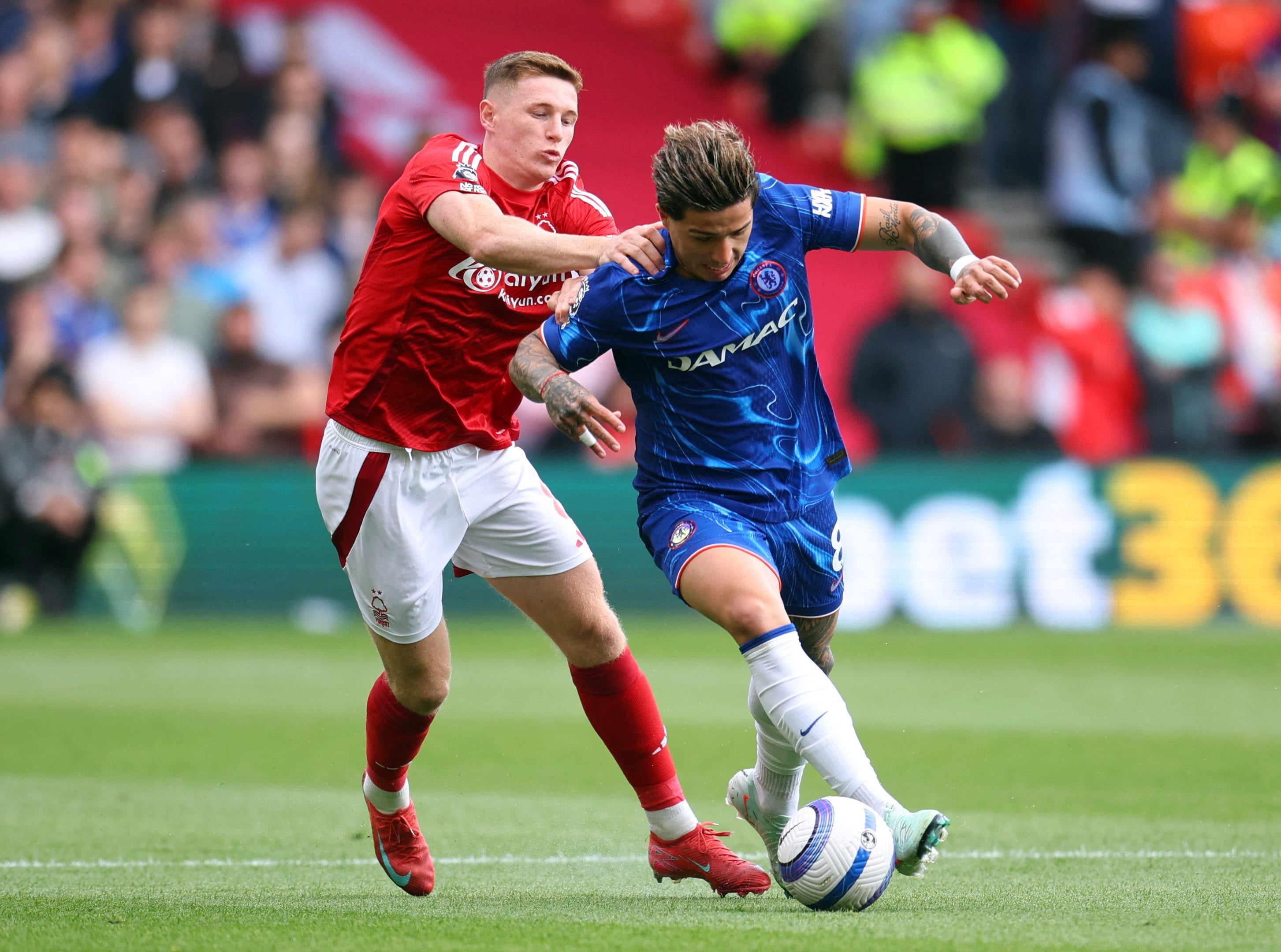 Chelsea's Enzo Fernandez in action with Nottingham Forest's Elliot Anderson