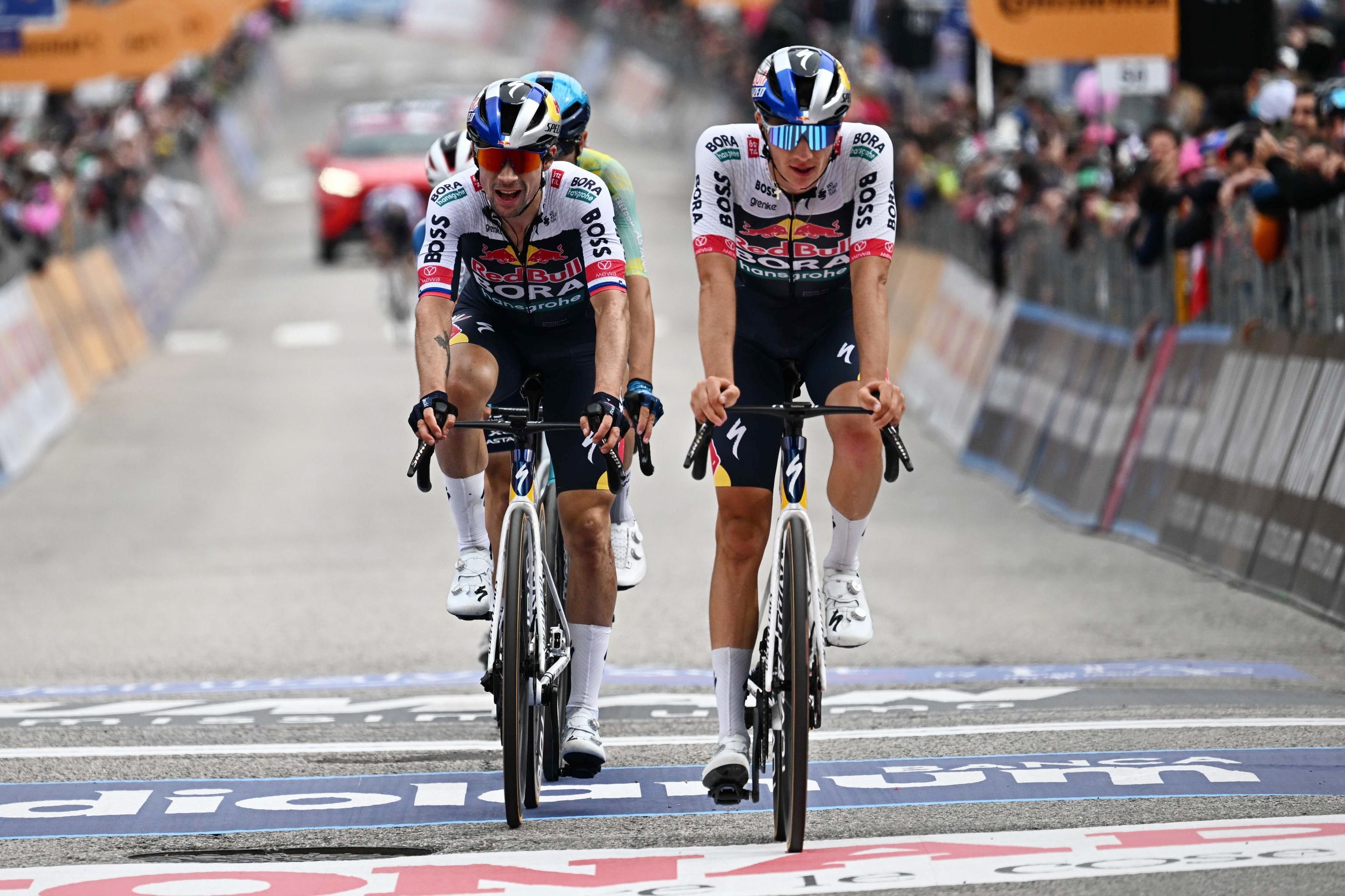 Primoz Roglic (left) endured another difficult day