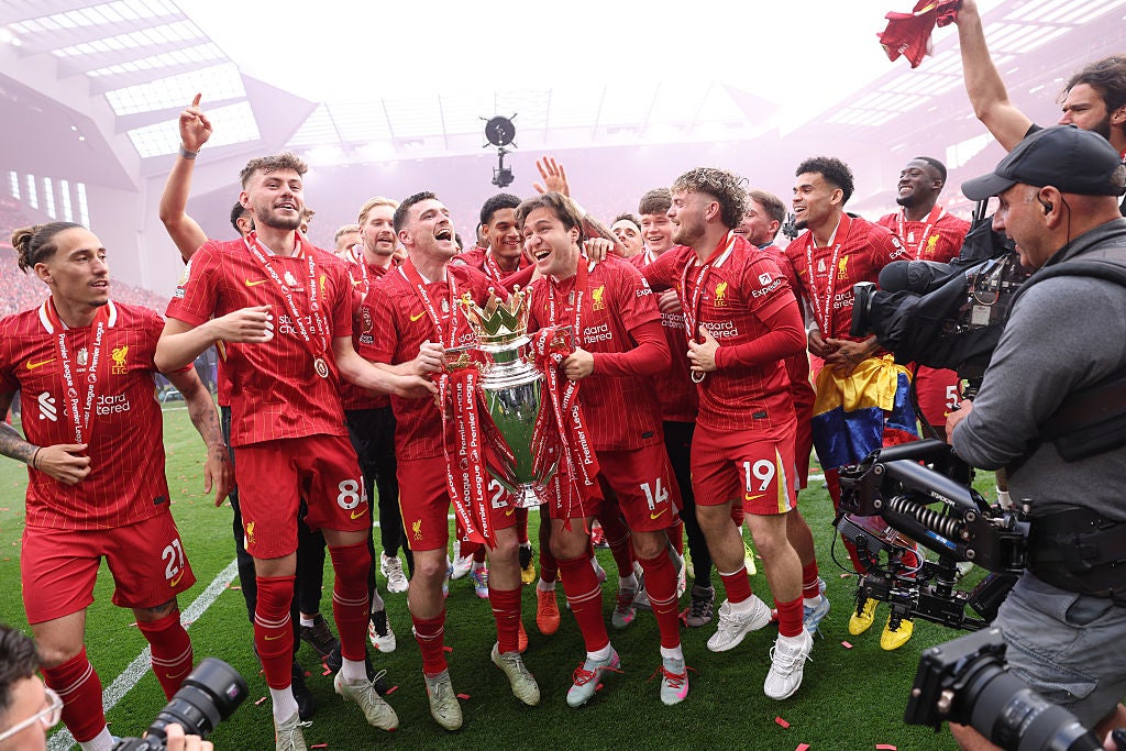 Federico Chiesa (holding trophy, right) became a Premier League champion despite being a bit-part player
