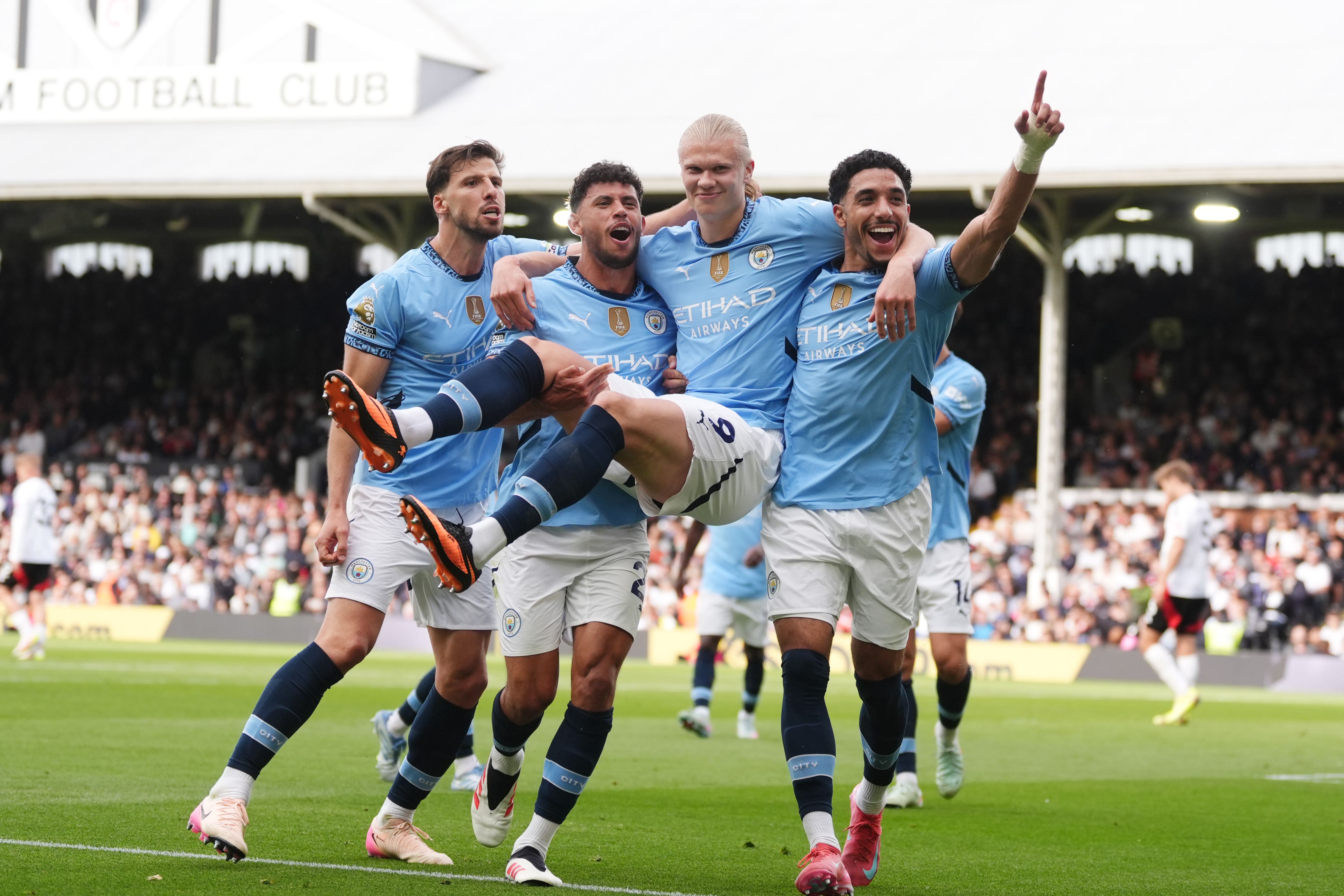 Manchester City clinch Champions League spot with victory at Fulham