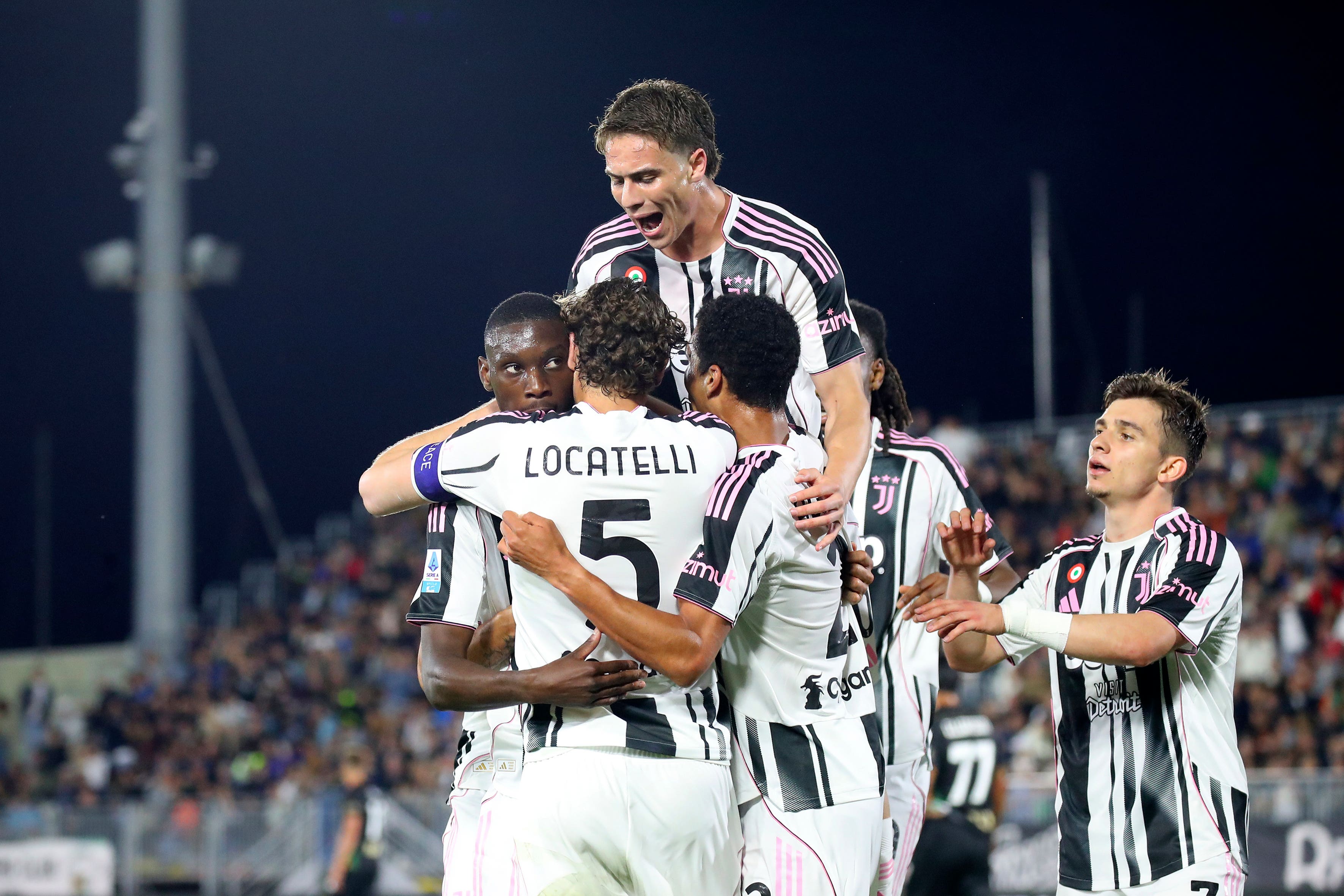 Randal Kolo Muani (left) celebrates with Juventus team-mates after scoring in the 3-2 win at Venezia which secured Champions League football next season (Paola Garbuio/LaPresse via AP)