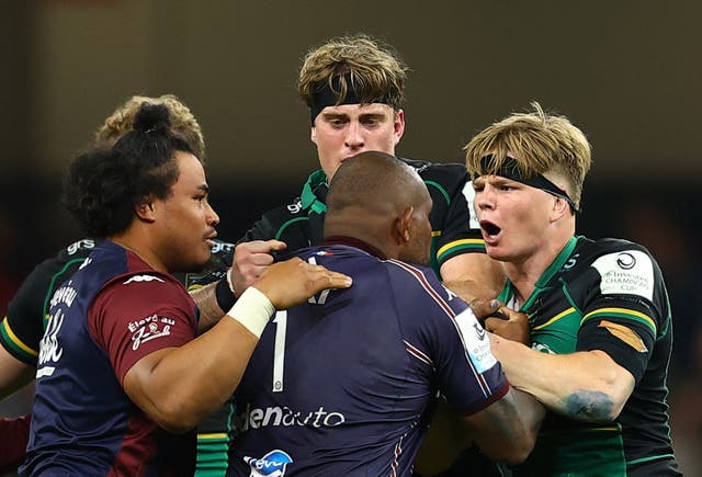 <p>Henry Pollock (right) was part of a fracas at full time</p>