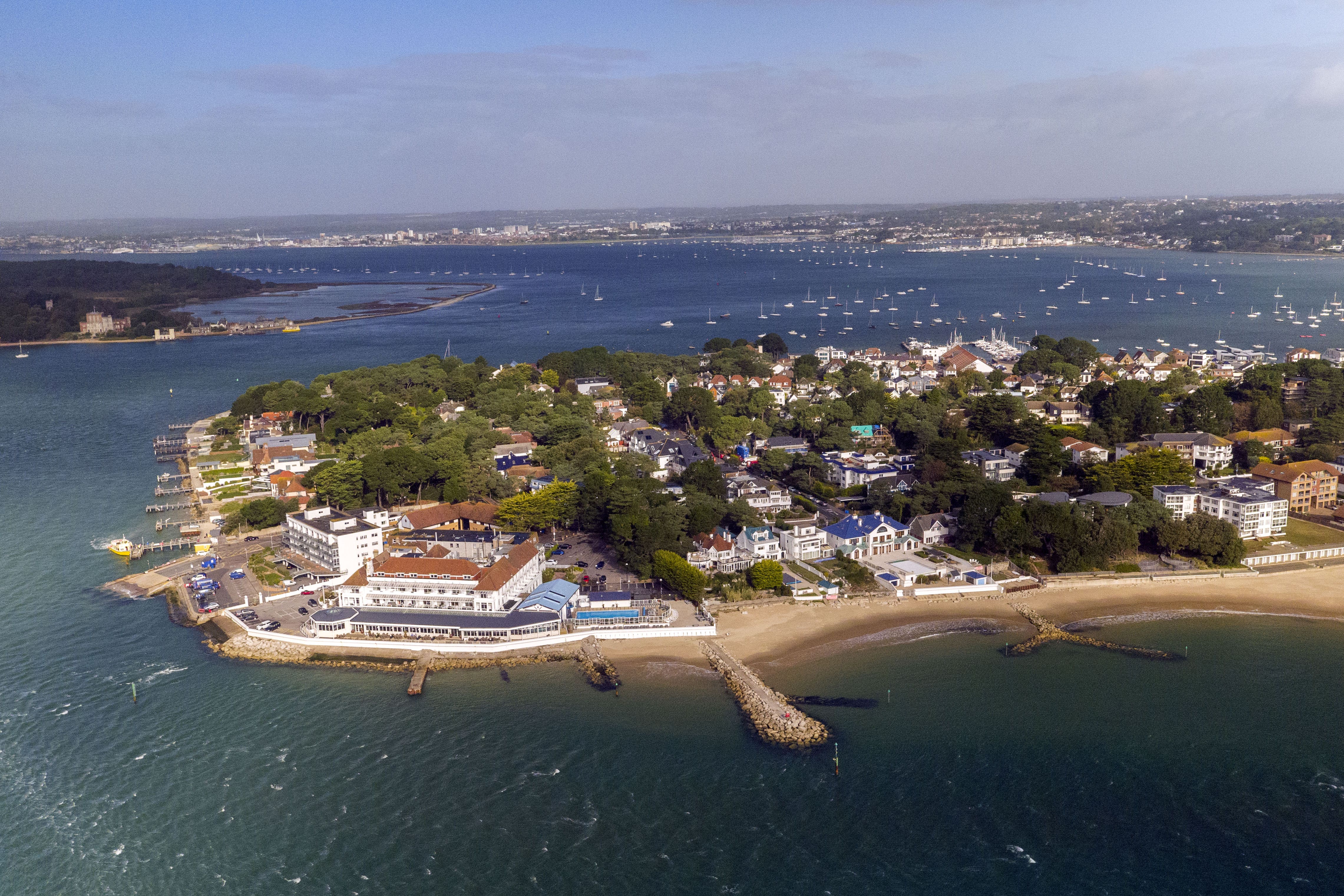 While the average house price in Sandbanks has fallen by 3% or £33,595 compared with 2023, it still sits at the top of Lloyds’ coastal property league (Steve Parsons/PA)