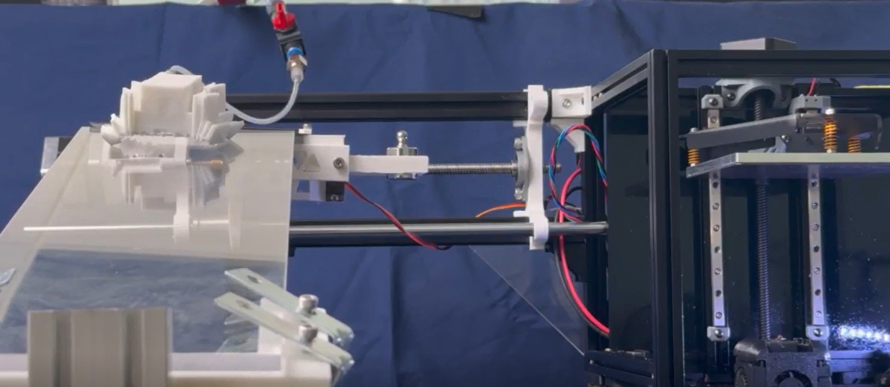 The soft robot is attached to air and then walks off the machine which made it (Maks Gepner/Edinburgh University/PA)