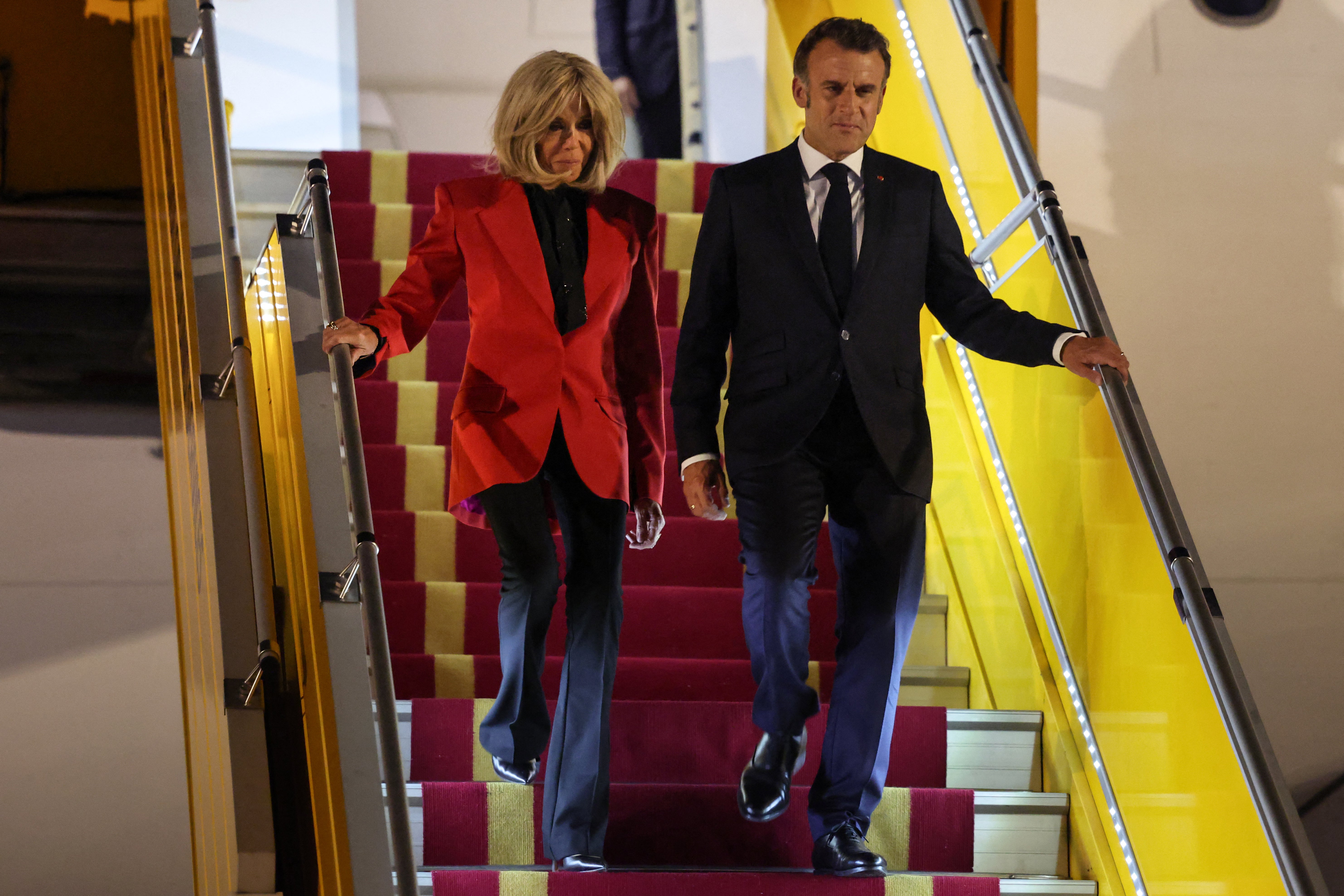 Brigitte Macron refused to take Macron’s arm as they disembarked. The couple met at Lycée La Providence, a Jesuit high school in Amiens, where Brigitte Macron was the future president’s drama teacher. He was 15 years old at the time.