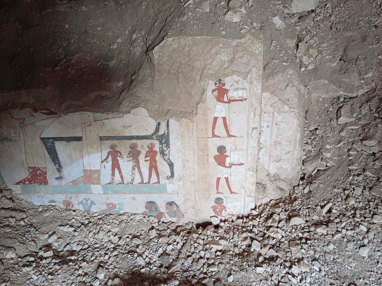 Hieroglyphs are revealed in the three new graves of senior statesmen found in the Dra' Abu al-Naga necropolis area in Luxor, Egypt. (Egypt Ministry of Tourism and Antiquities via AP)