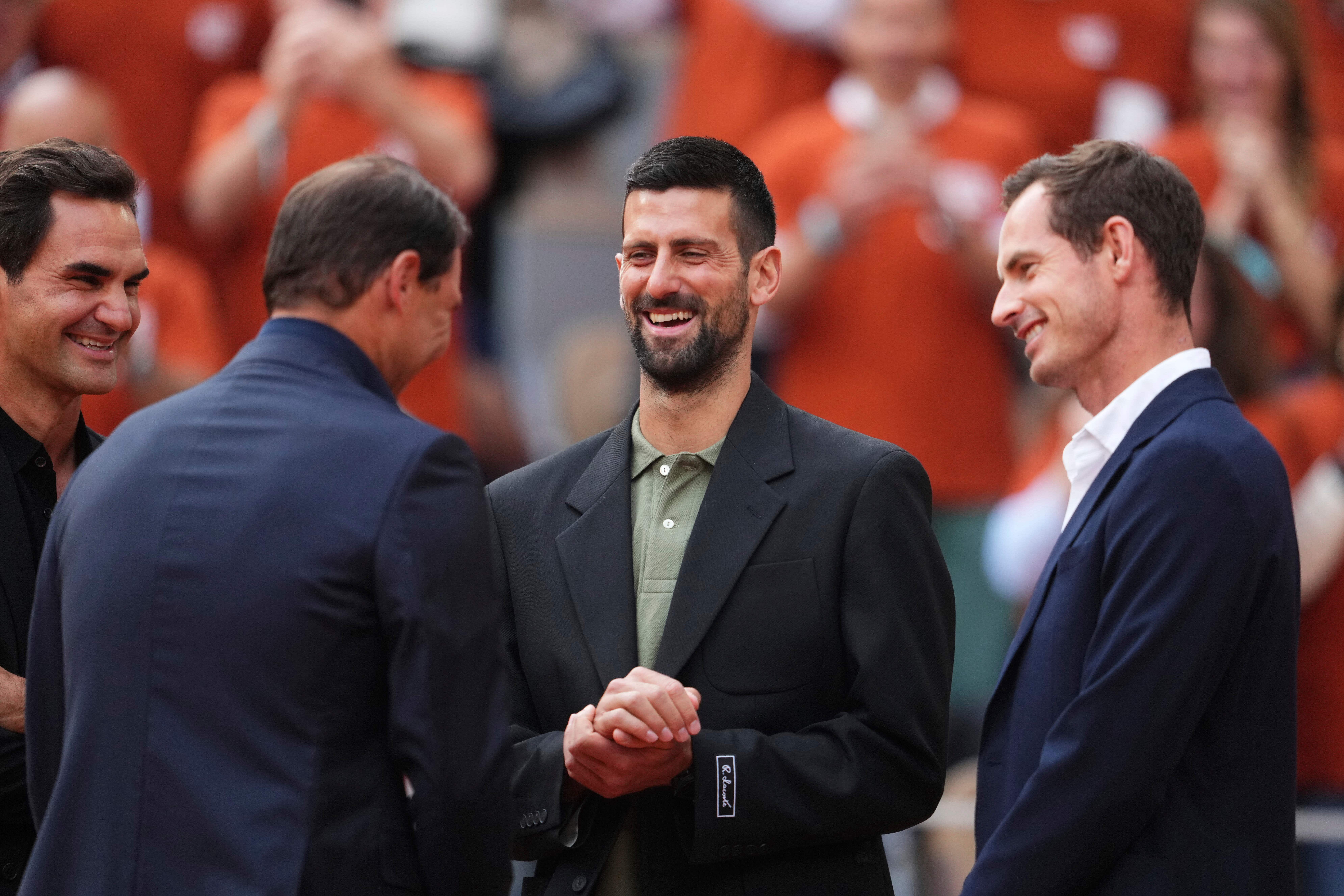 Andy Murray, right, and Novak Djokovic, left, were reunited at Rafael Nadal’s ceremony at Roland Garros (Lindsey Wasson/AP)