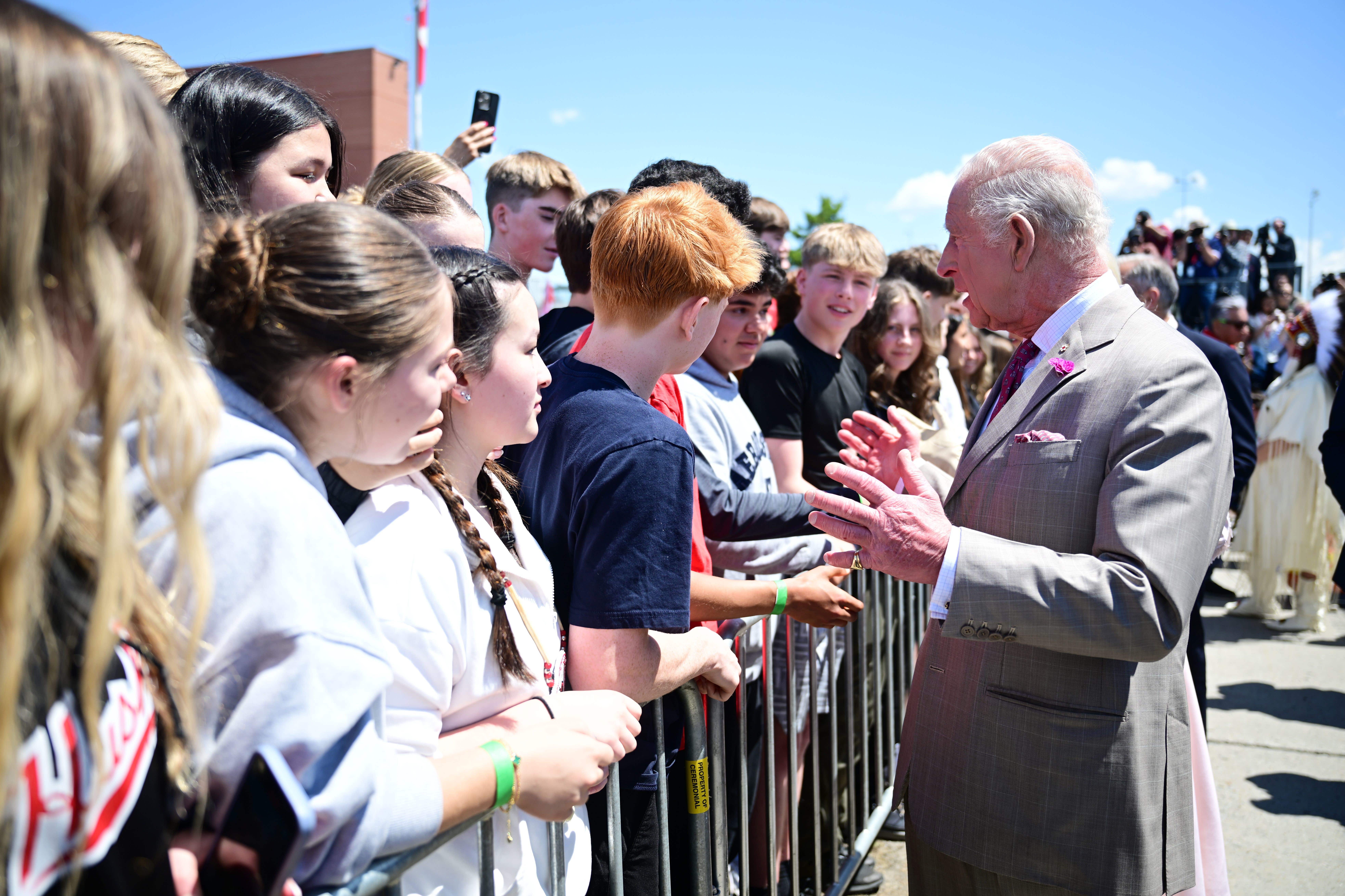 The King meets schoolchildren as he arrives in Ottawa (Victoria Jones/PA)