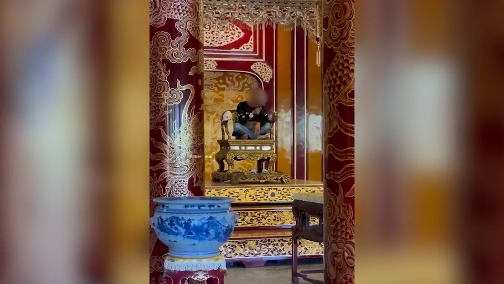 The 42-year-old climbed onto the throne and broke part of it before being subdued by palace museum security