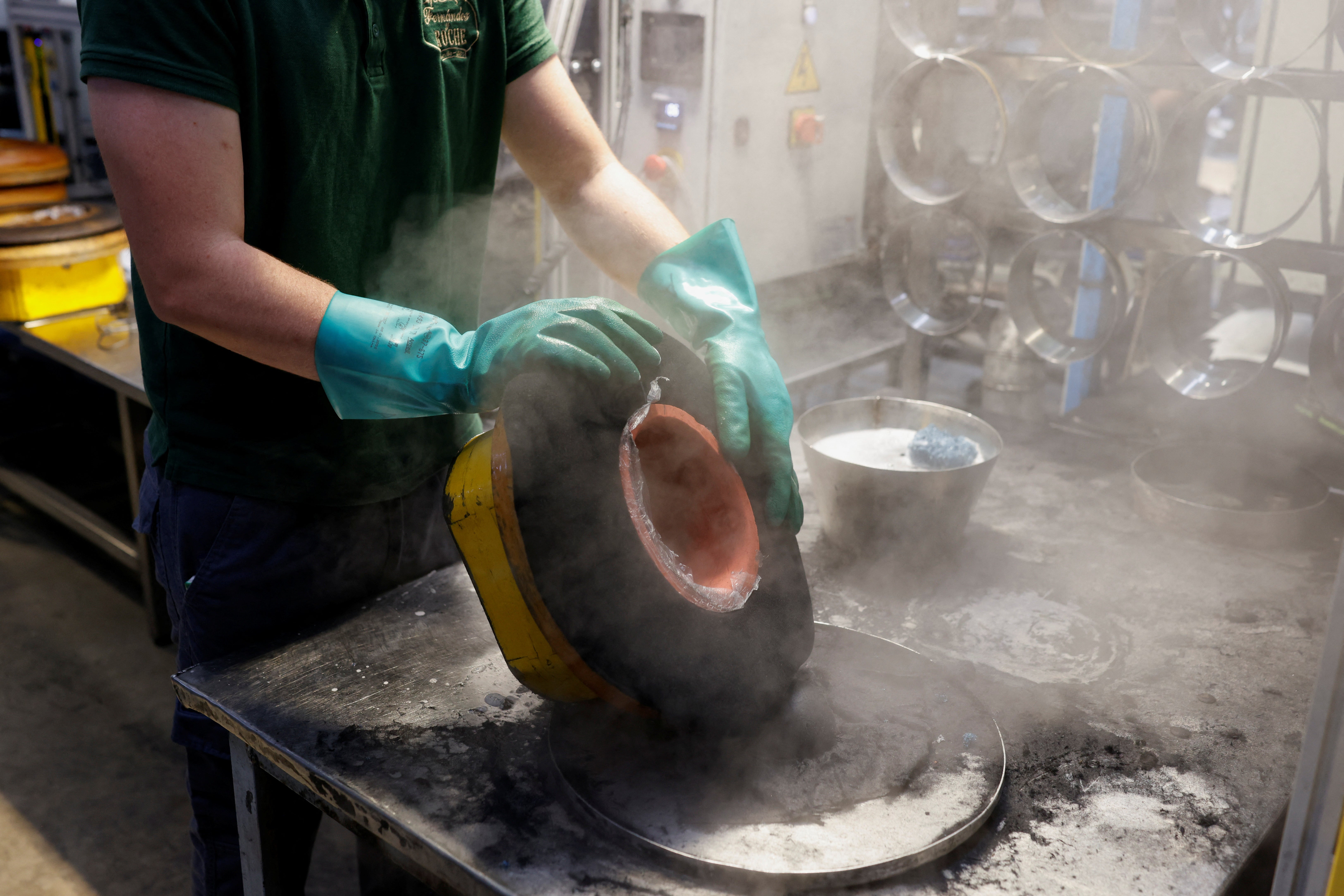 A person works at 140-year-old Fernandez y Roche Industrias Sombrereras Espanolas factory, which produces Orthodox Jewish hats, in Salteras, near Seville