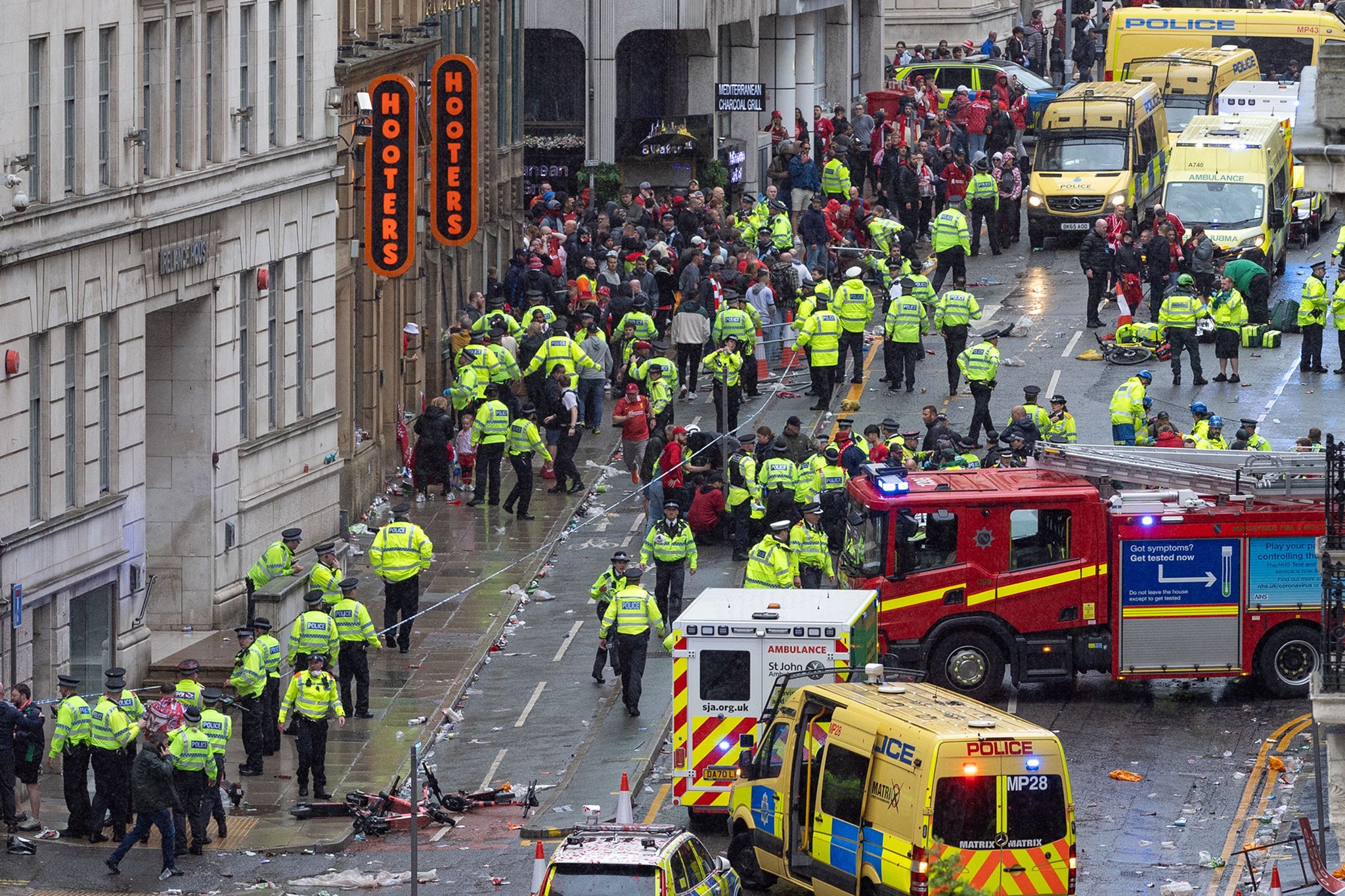 The scene in the wake of the crash, with fire rescue teams, ambulance workers and police working together to support the public