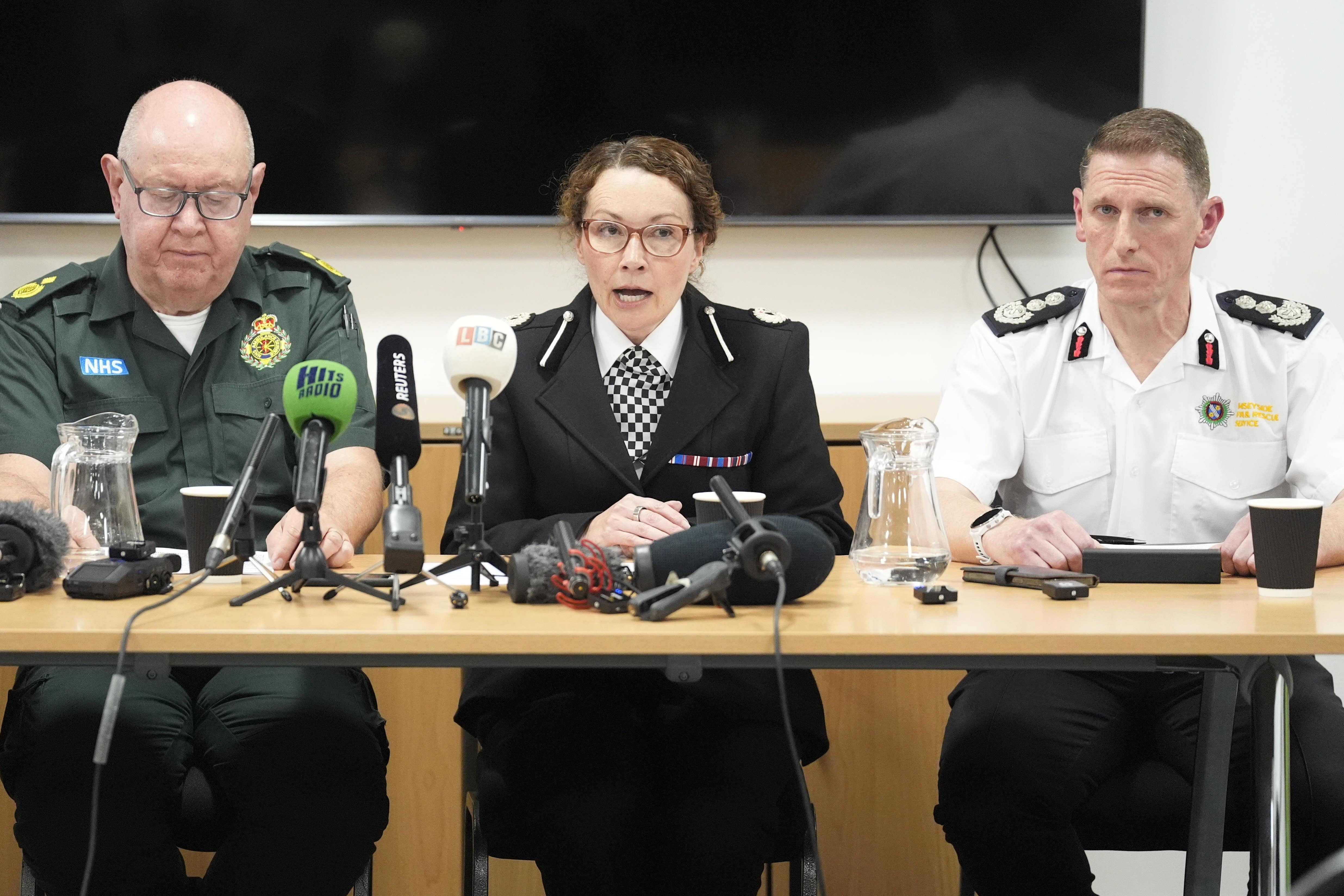 (left to right) North West Ambulance Service’s Dave Kitchin, Merseyside Police’s Assistant Chief Constable Jenny Sims and Nick Searle, chief fire officer for Merseyside Fire and Rescue Service (Danny Lawson/PA)