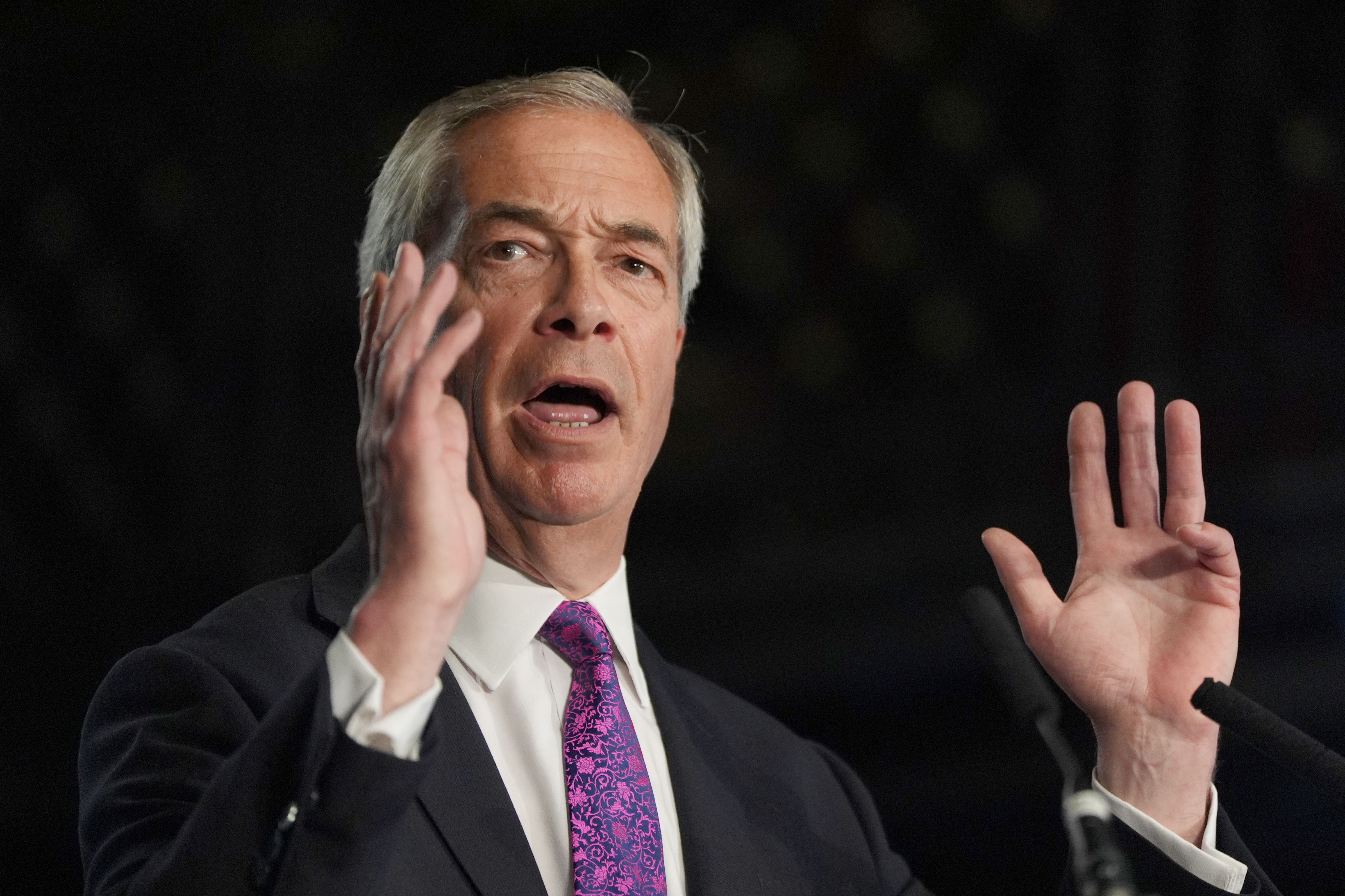 Nigel Farage defended his party’s advert against Scottish Labour leader Anas Sarwar (Ben Whitley/PA)