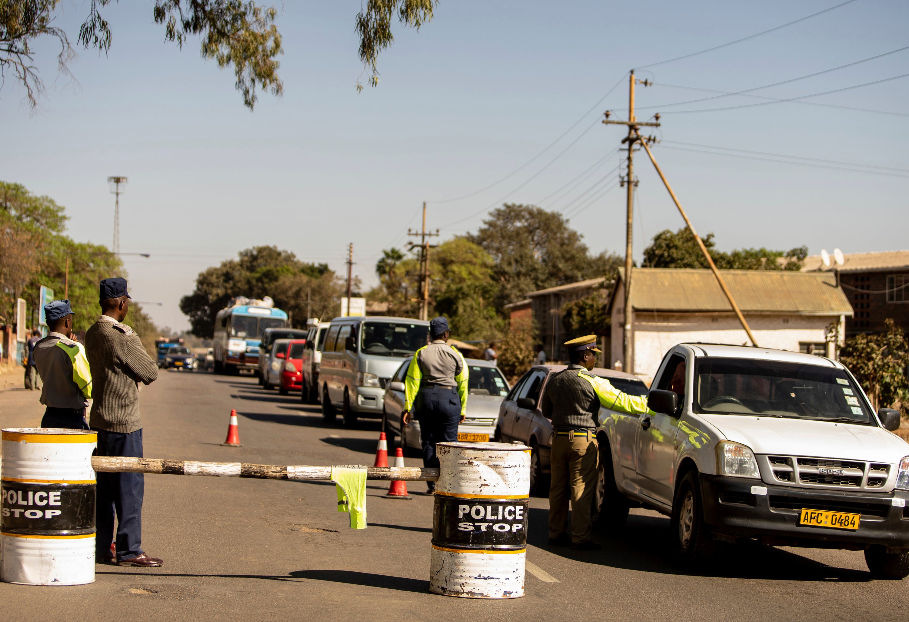 Police man at a roadblock in Bulawayo, Zimbabwe, 2019