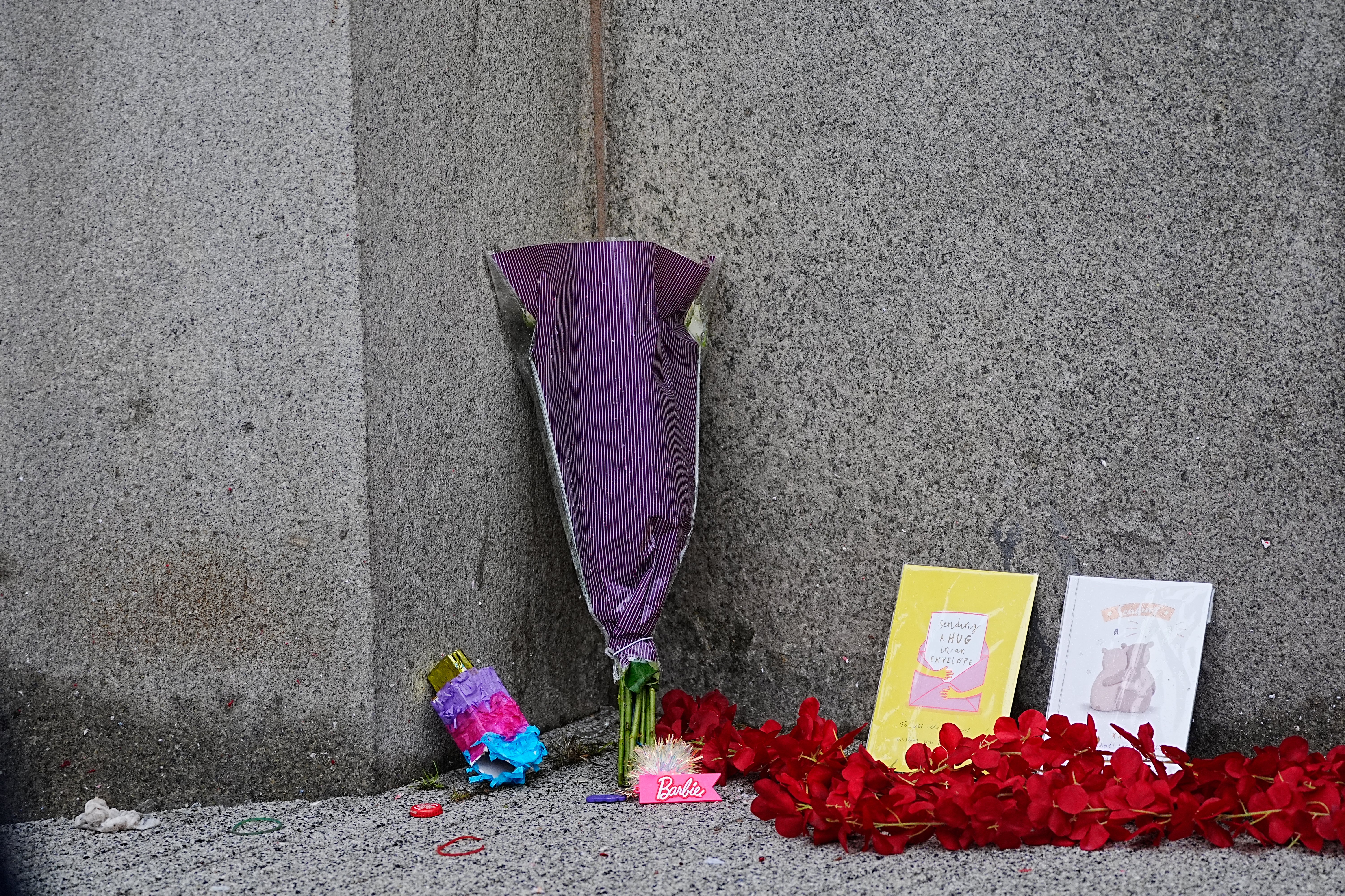 Flowers were left at the scene on Water Street on Tuesday