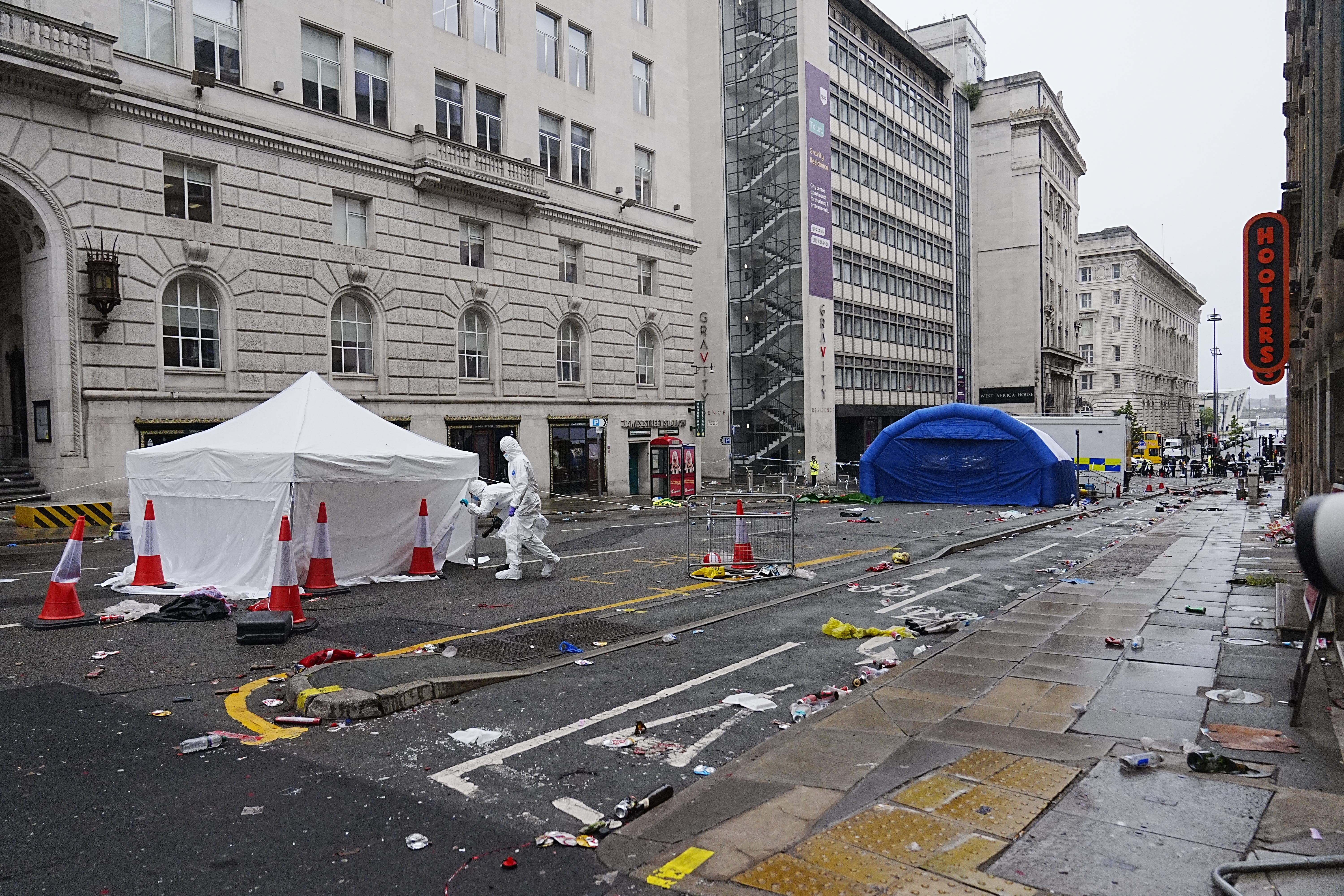 Forensic officers at the scene on Water Street