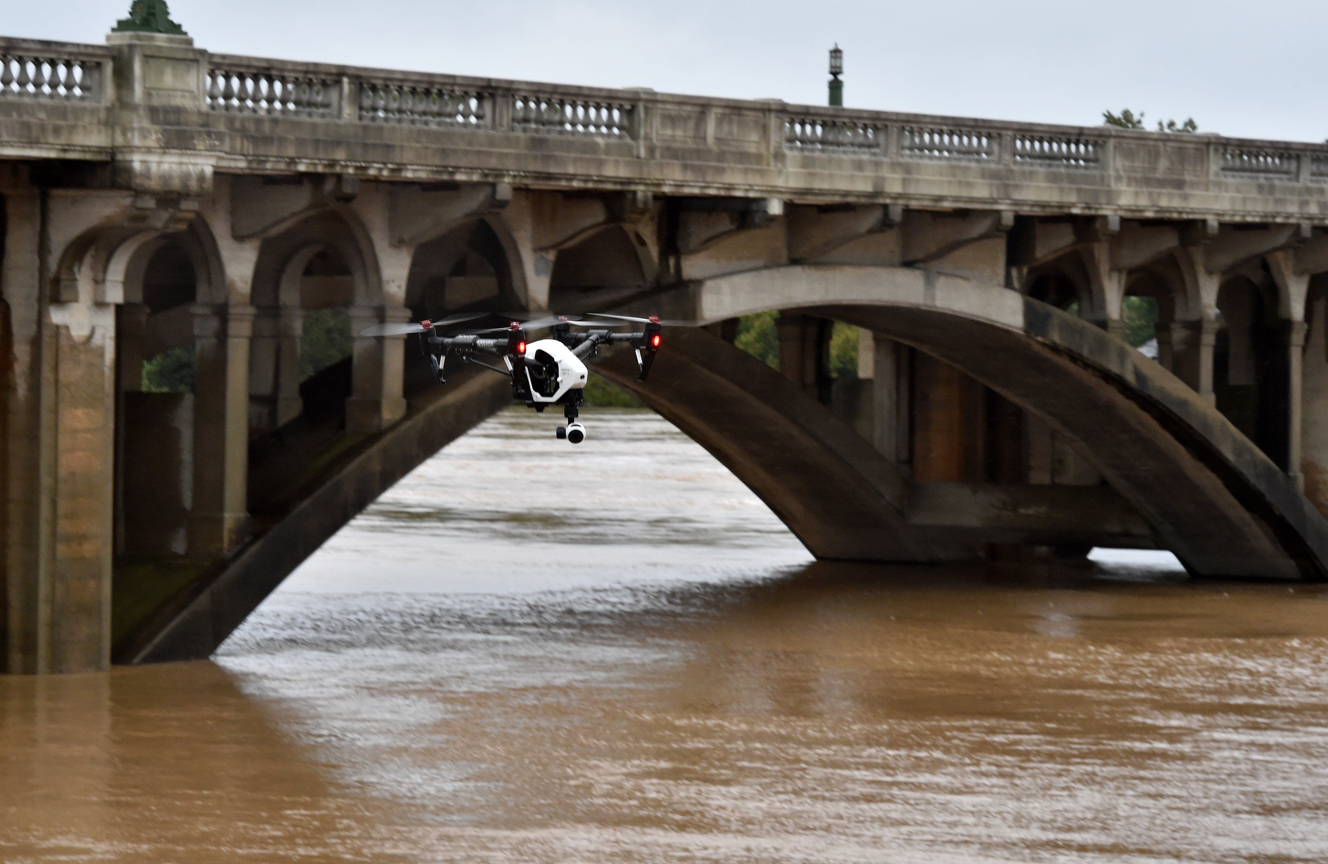 A drone flies over the waters of Congaree River in Columbia in South Carolina during adverse weather. A body was found along by the river over Memorial Day weekend.