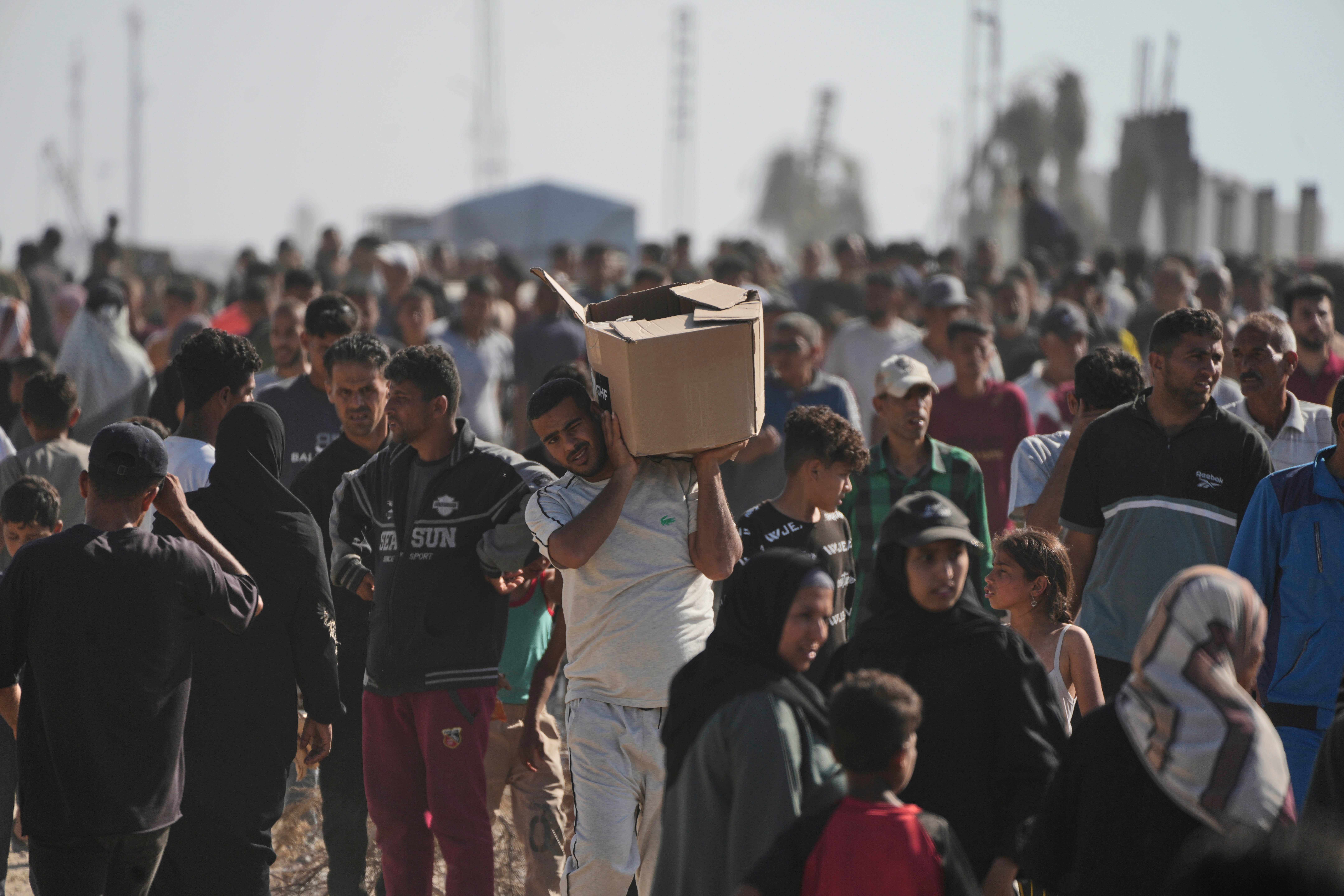 Thousands of Palestinians made their way to the foundation’s distribution points in search of food