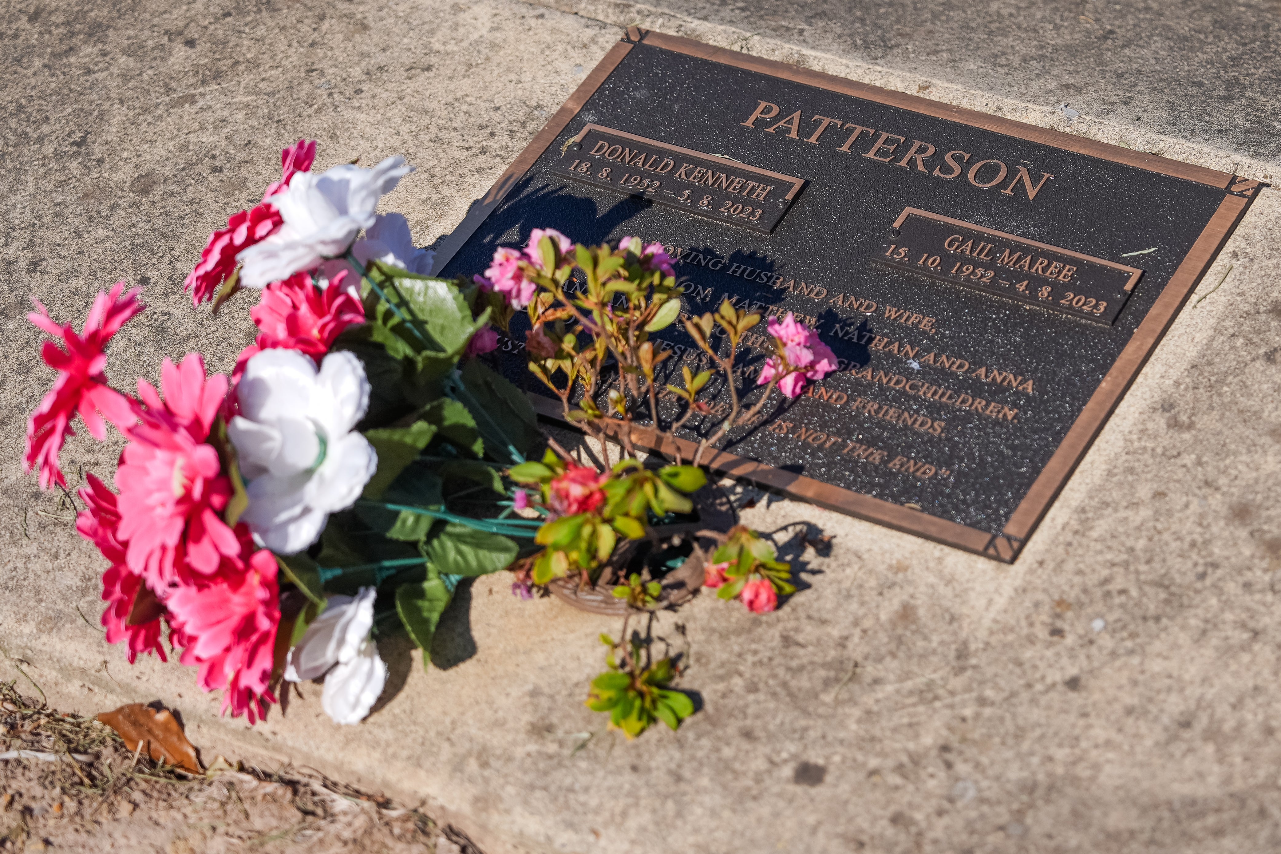 A memorial plaque on the grave site for Don and Gail Patterson at the Korumburra General Cemetery in Australia