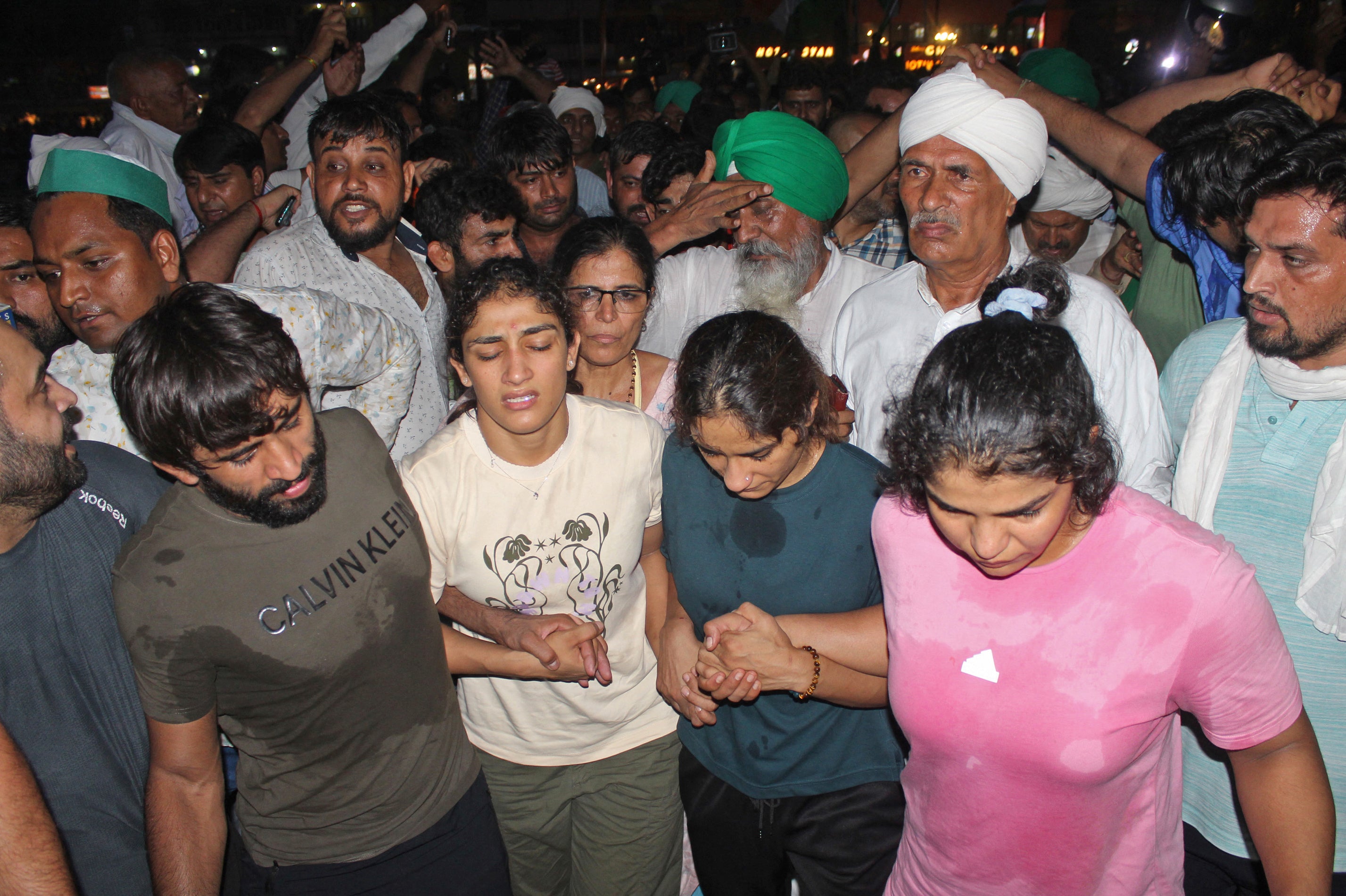 Indian wrestlers along with their supporters gather to immerse their medals in the river Ganges as a mark of protest against Brij Bhushan Singh